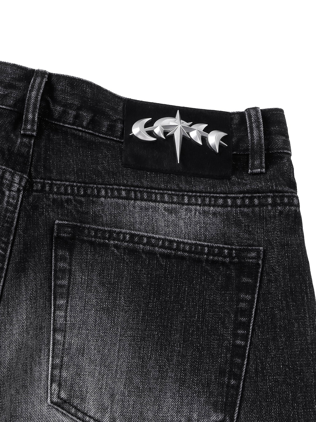 TBHNP T260017 black jeans, back pocket and star-and-crescent hardware.