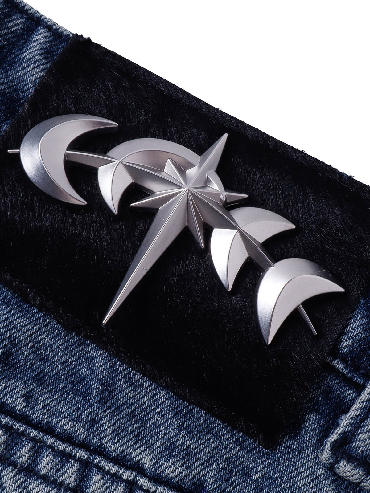 Silver moon-and-star astral emblem on a black back-waist patch