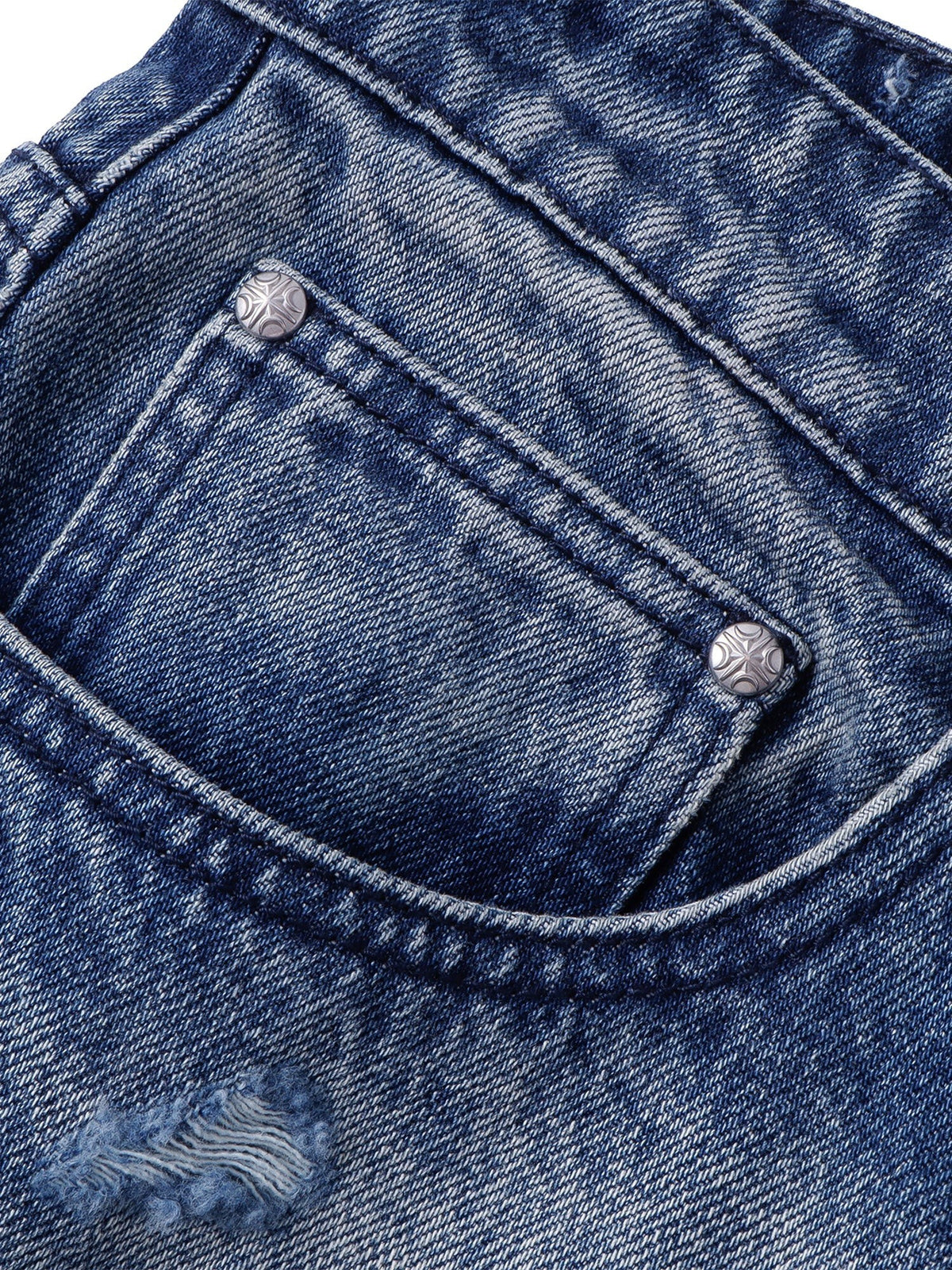 Close-up of the curved front pocket and branded metal rivets