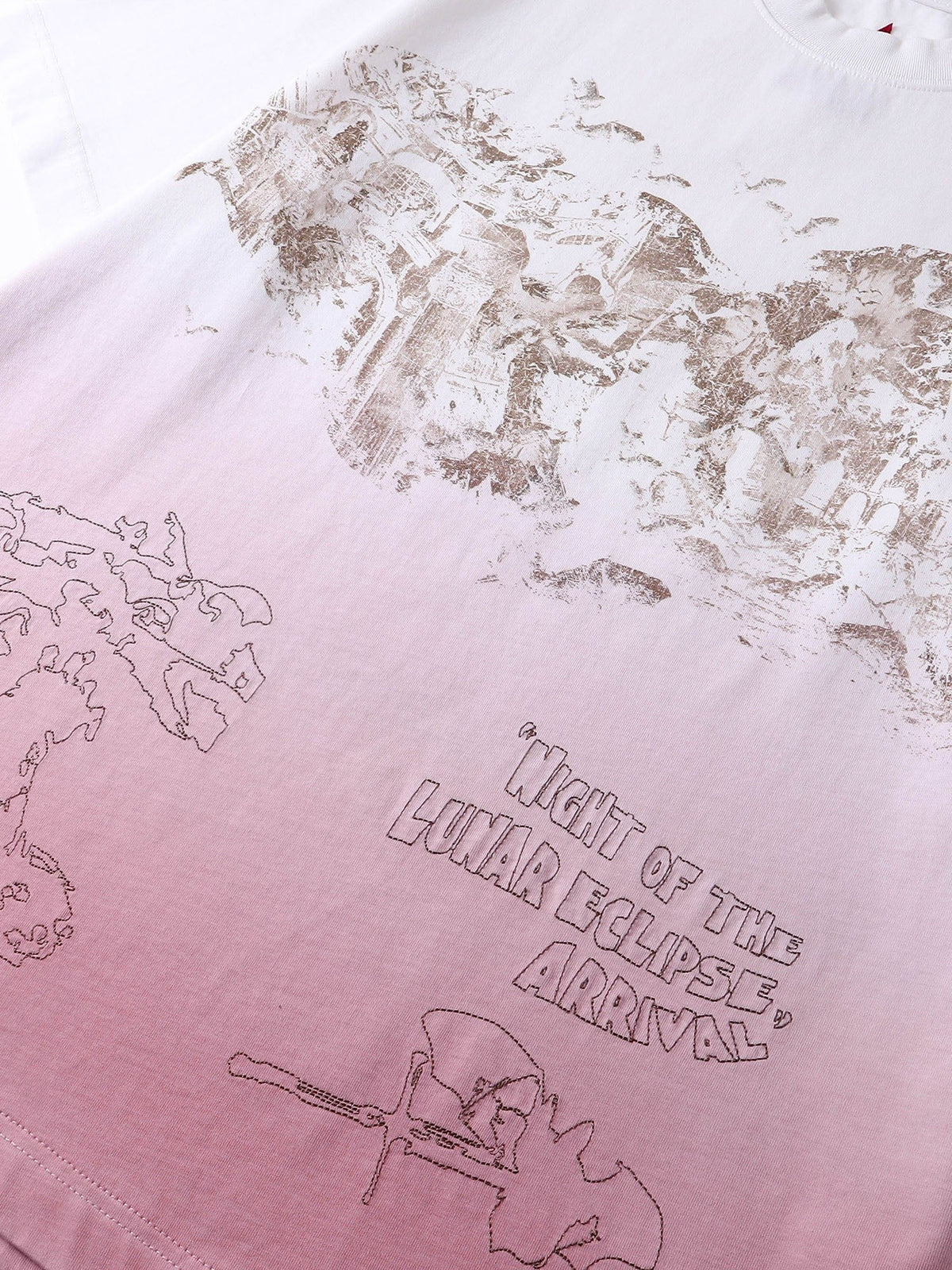 Close-up of the washed distressed print on TBHNP white arrival tee — men's streetwear detail