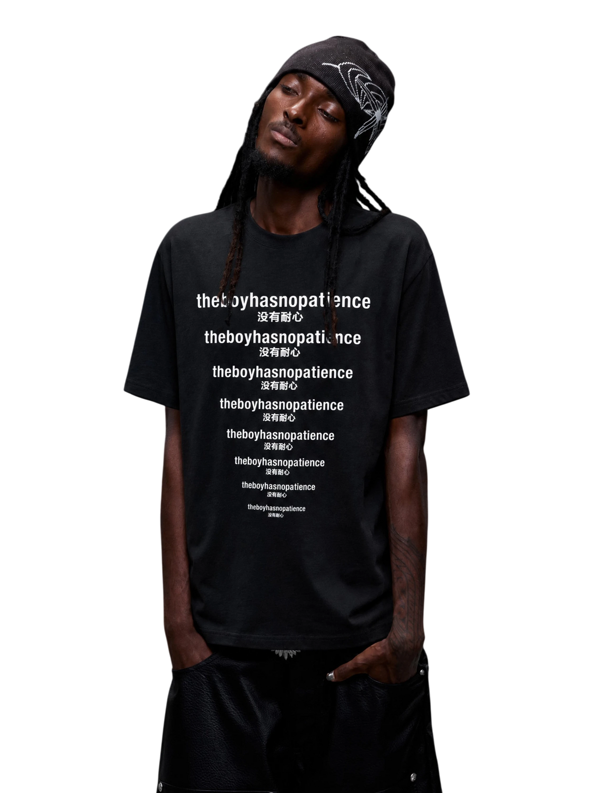 Model wearing the black Luminous Dawn slogan T-shirt in a relaxed straight fit
