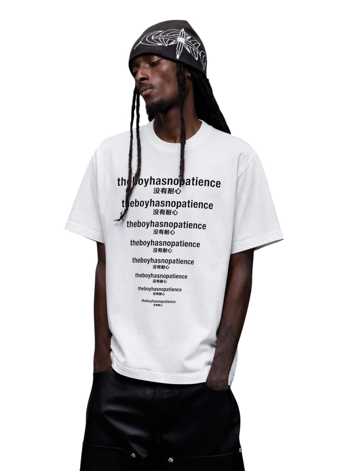 Model wearing the white Luminous Dawn slogan T-shirt in a front three-quarter view