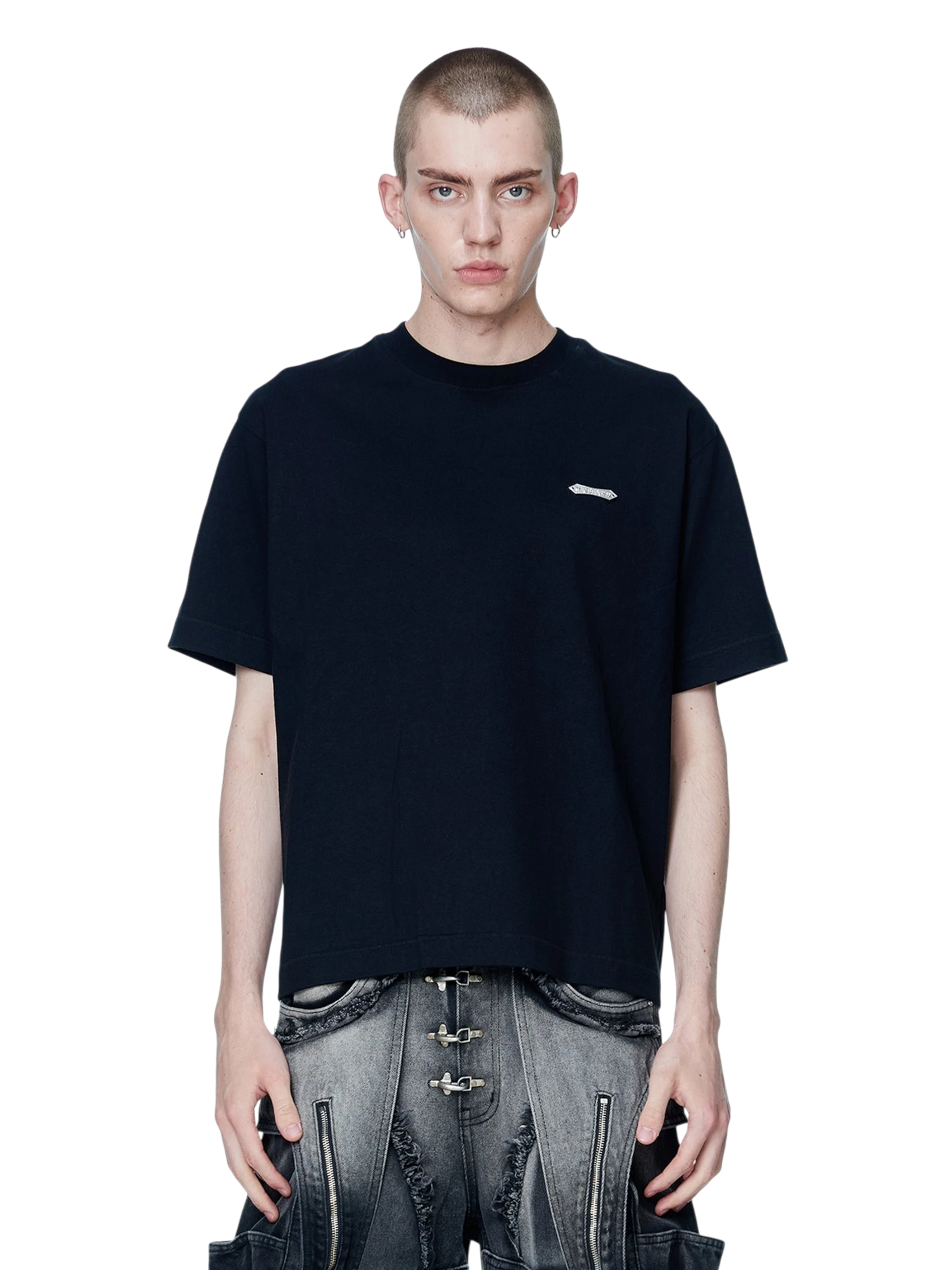 Model wearing TBHNP black Emblem & Shadowbat tee, front — men's streetwear tee