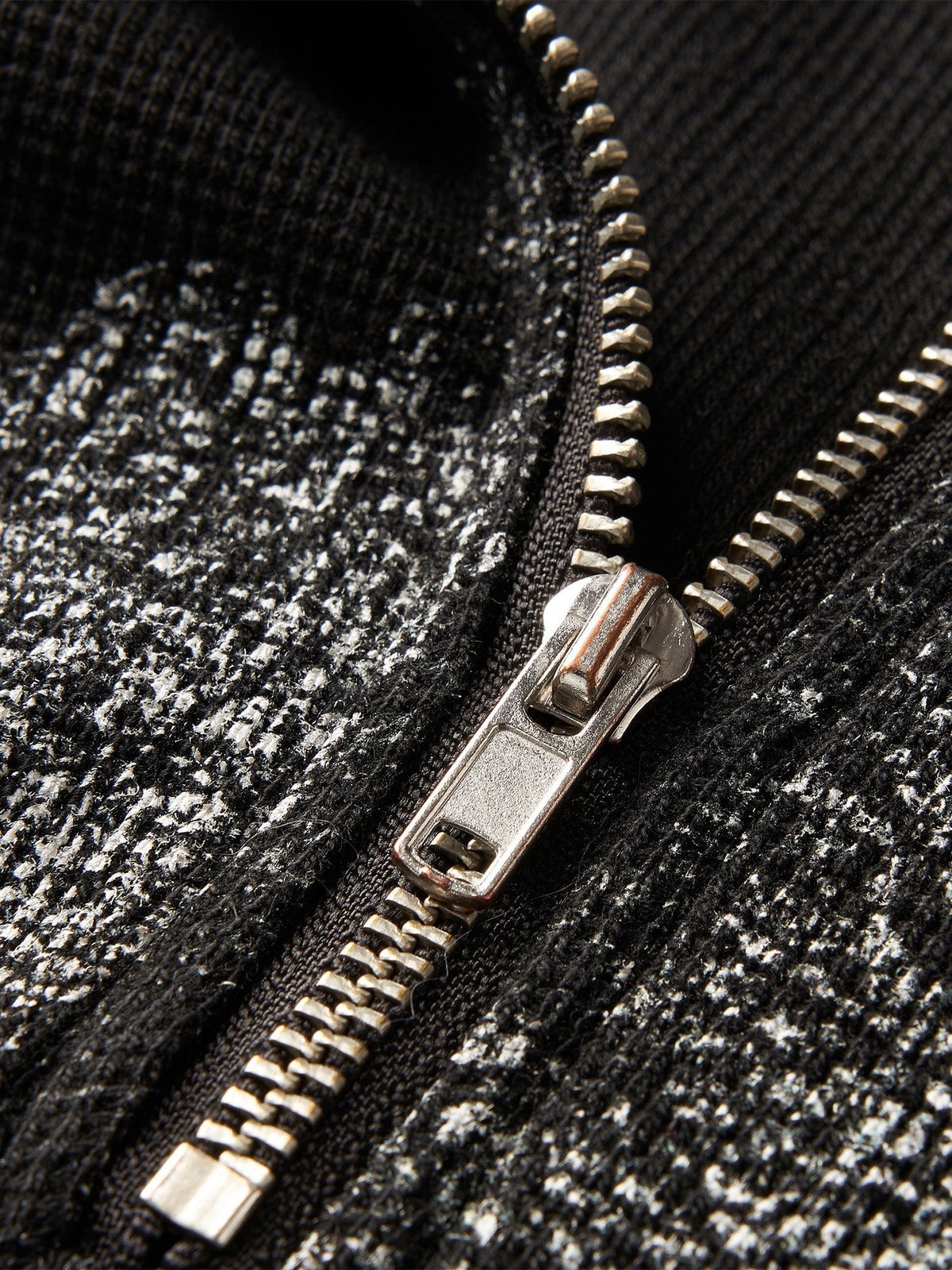 Close-up of the half-zip collar zipper on TBHNP black waffle henley tee — men's streetwear detail
