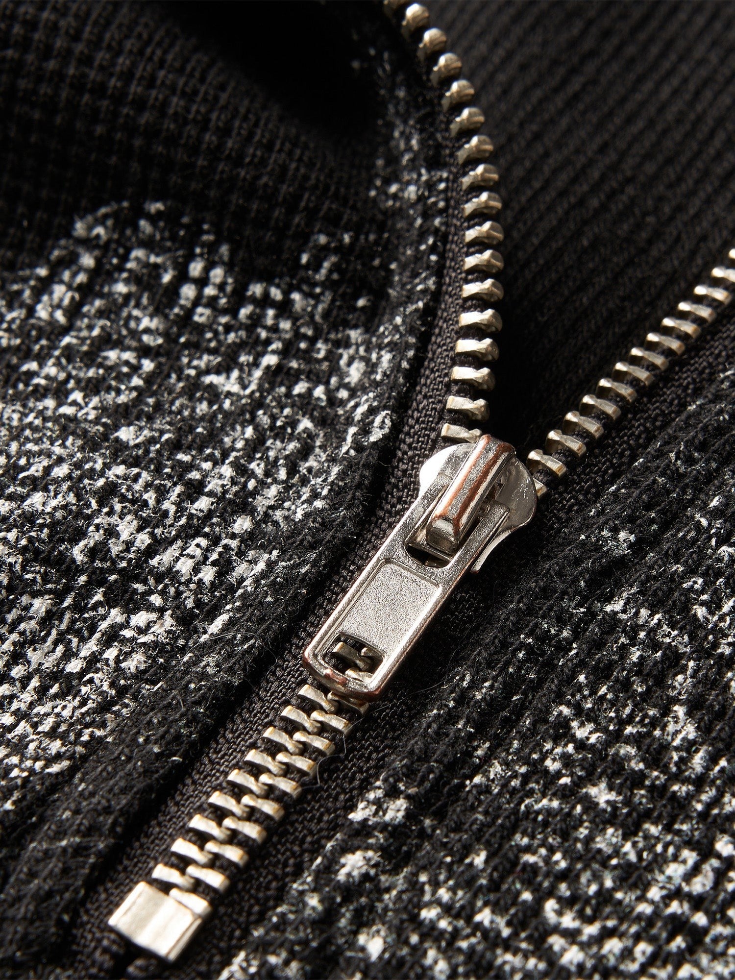 Close-up of the half-zip collar zipper on TBHNP black waffle henley tee — men's streetwear detail