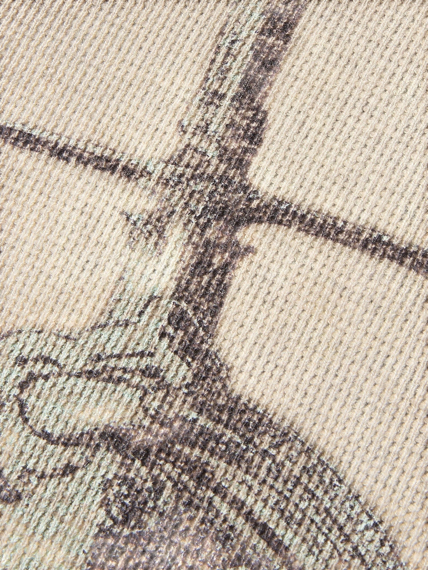 Close-up of the sword-and-bone gothic print on TBHNP grey waffle-knit tee — men's streetwear detail