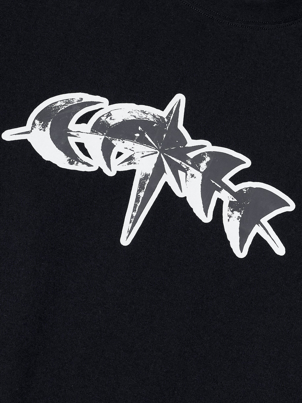 Close-up of the 3M reflective star logo print on black cotton