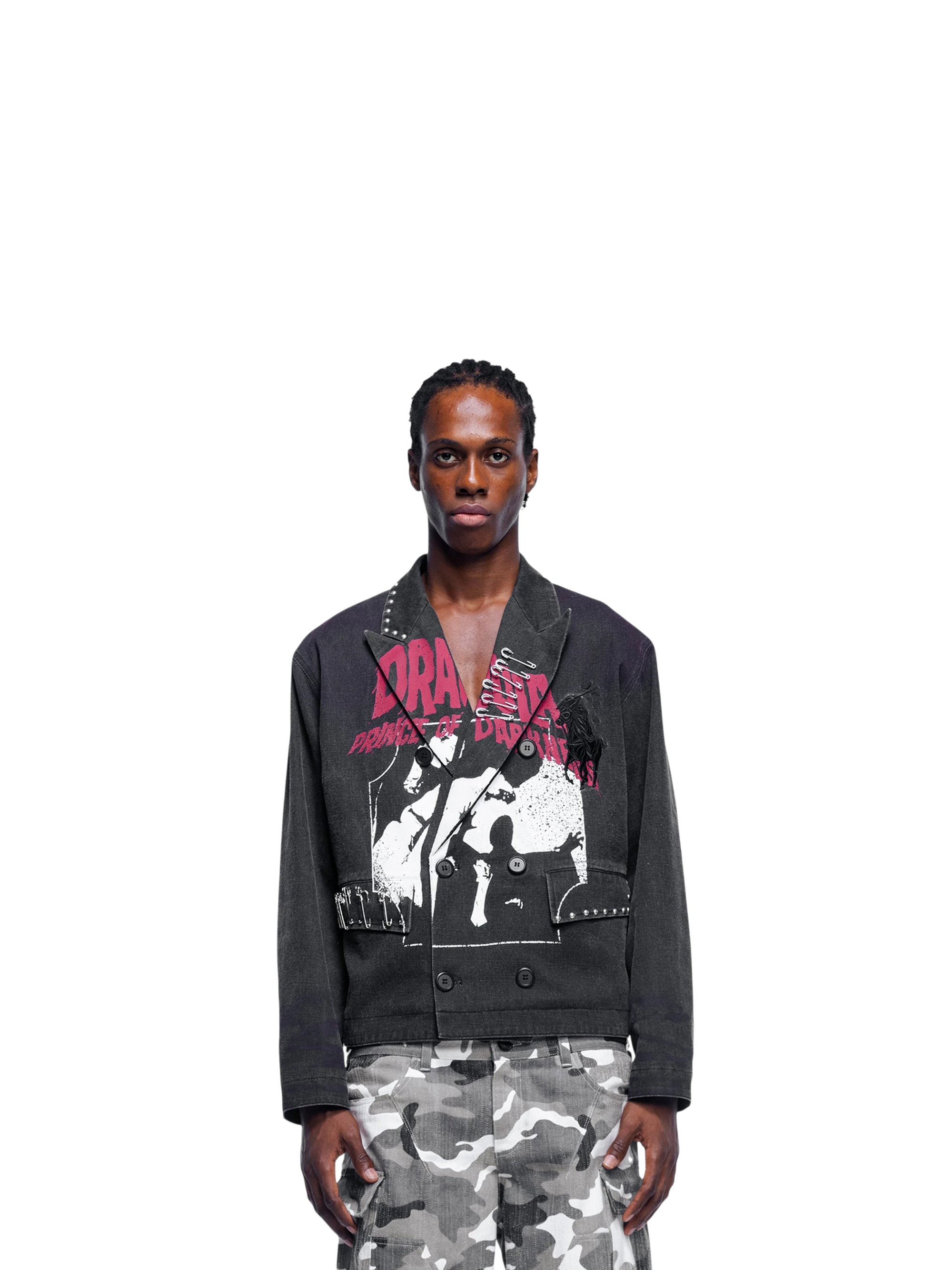 Male model wearing TBHNP black graphic blazer, front — men's streetwear blazer