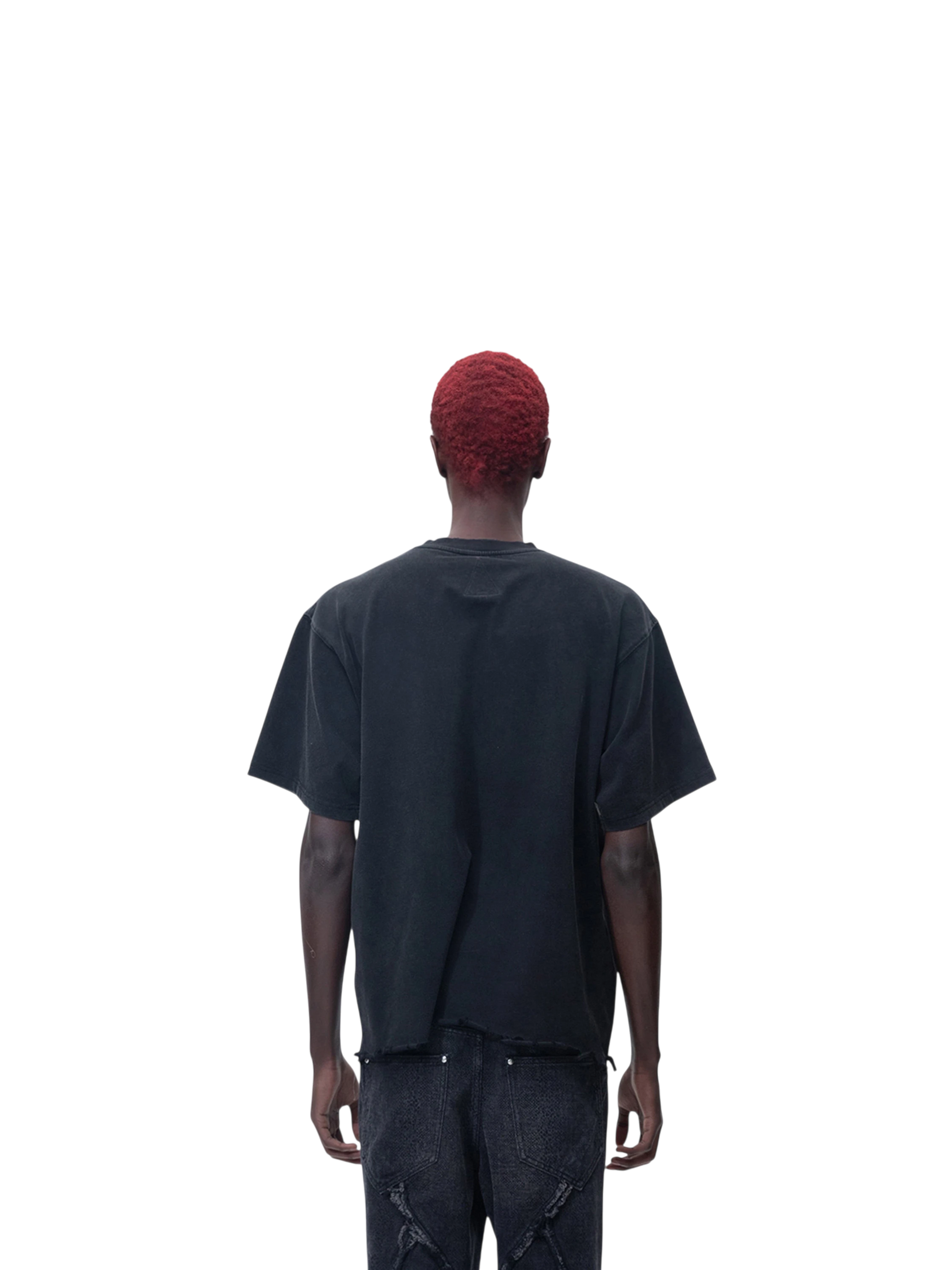 Model wearing TBHNP black Wraith Sorcerer destroyed tee, back view — men's streetwear tee