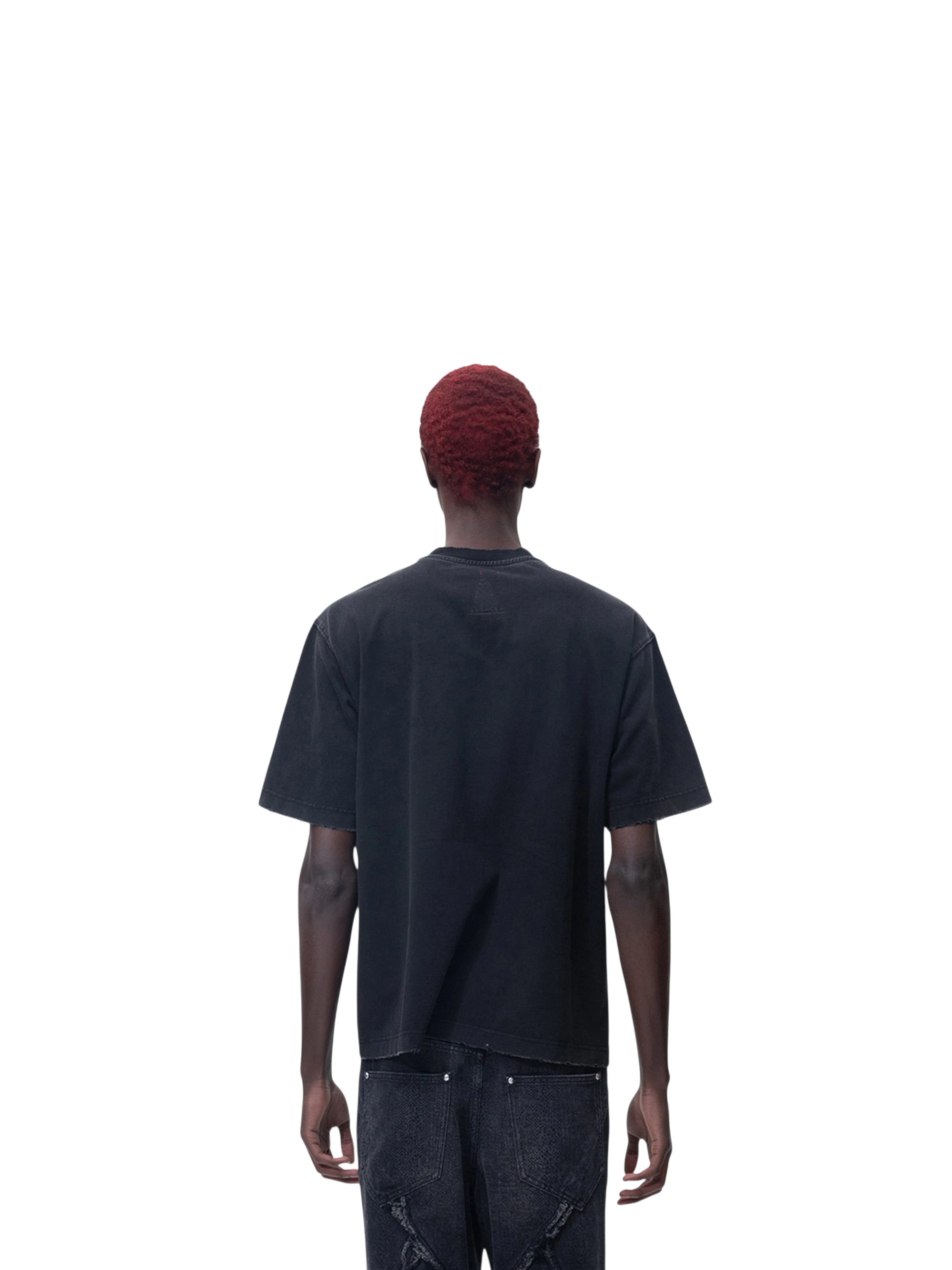 Model in TBHNP black arrival short-sleeve tee, front view — men's streetwear tee