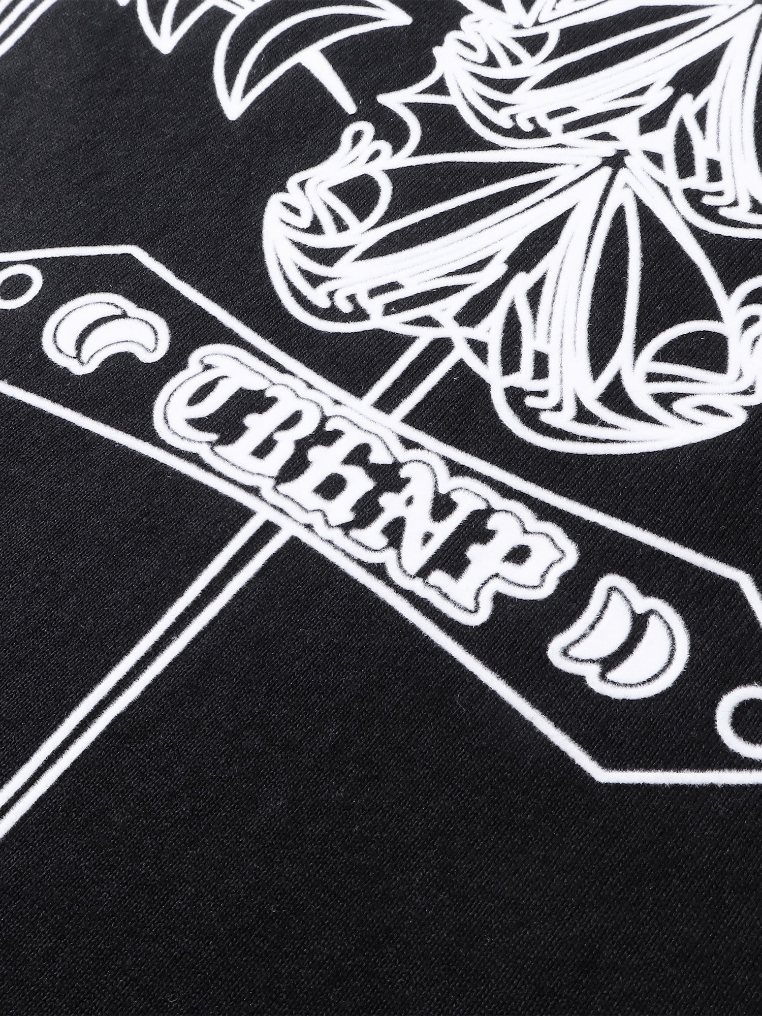 Close-up of the emblem and shadowbat back print on TBHNP black tee — men's streetwear detail