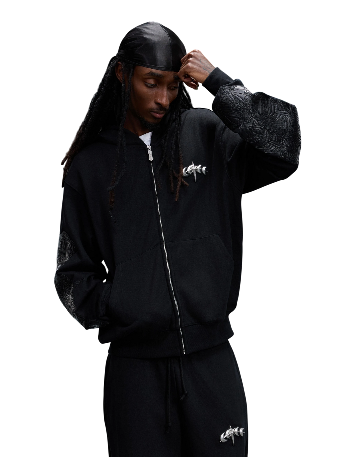Close-up of the black hoodie sleeve leather patch.