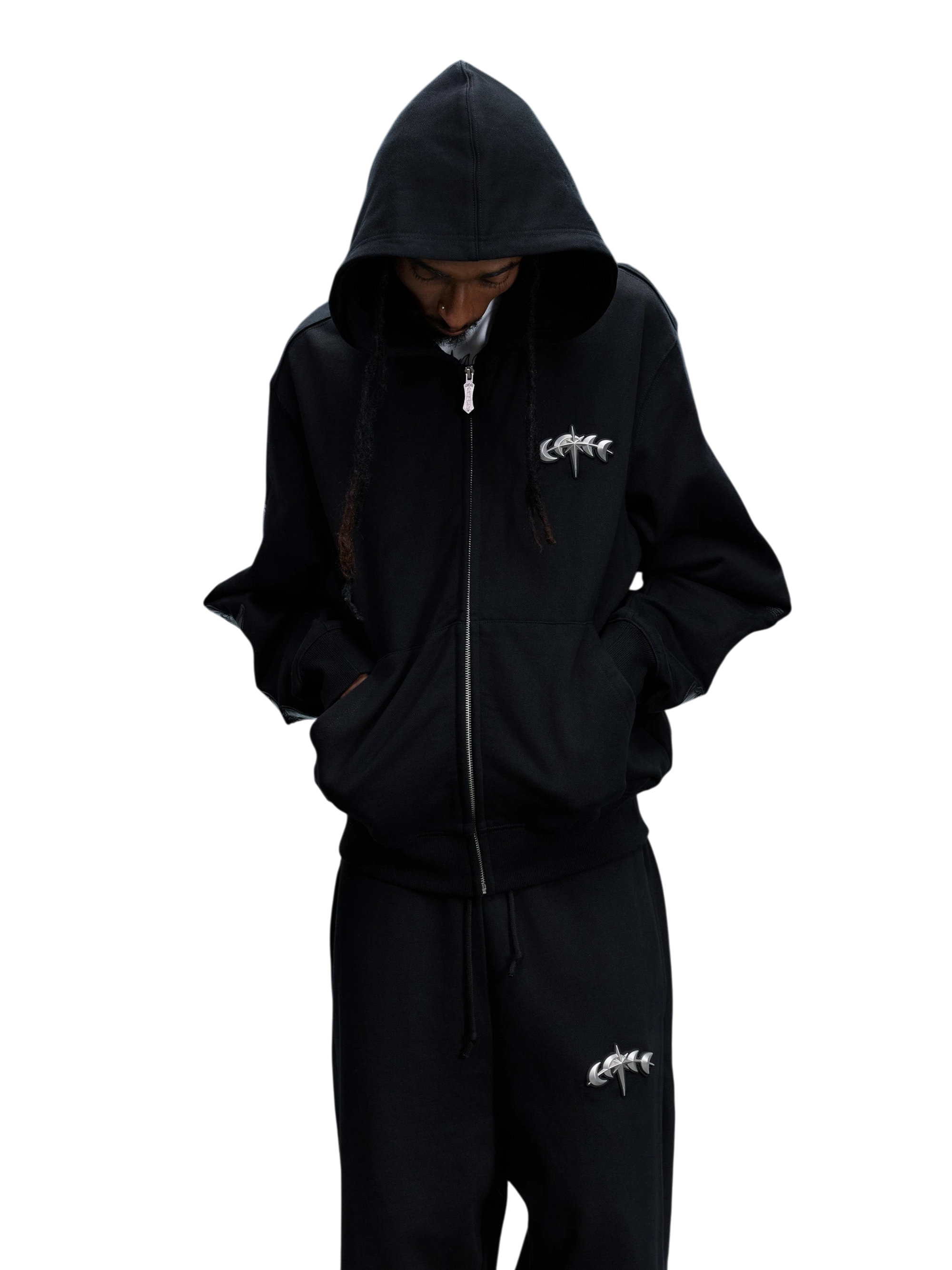 Model wearing the black Leather Patch Zip Hoodie, angled front view.