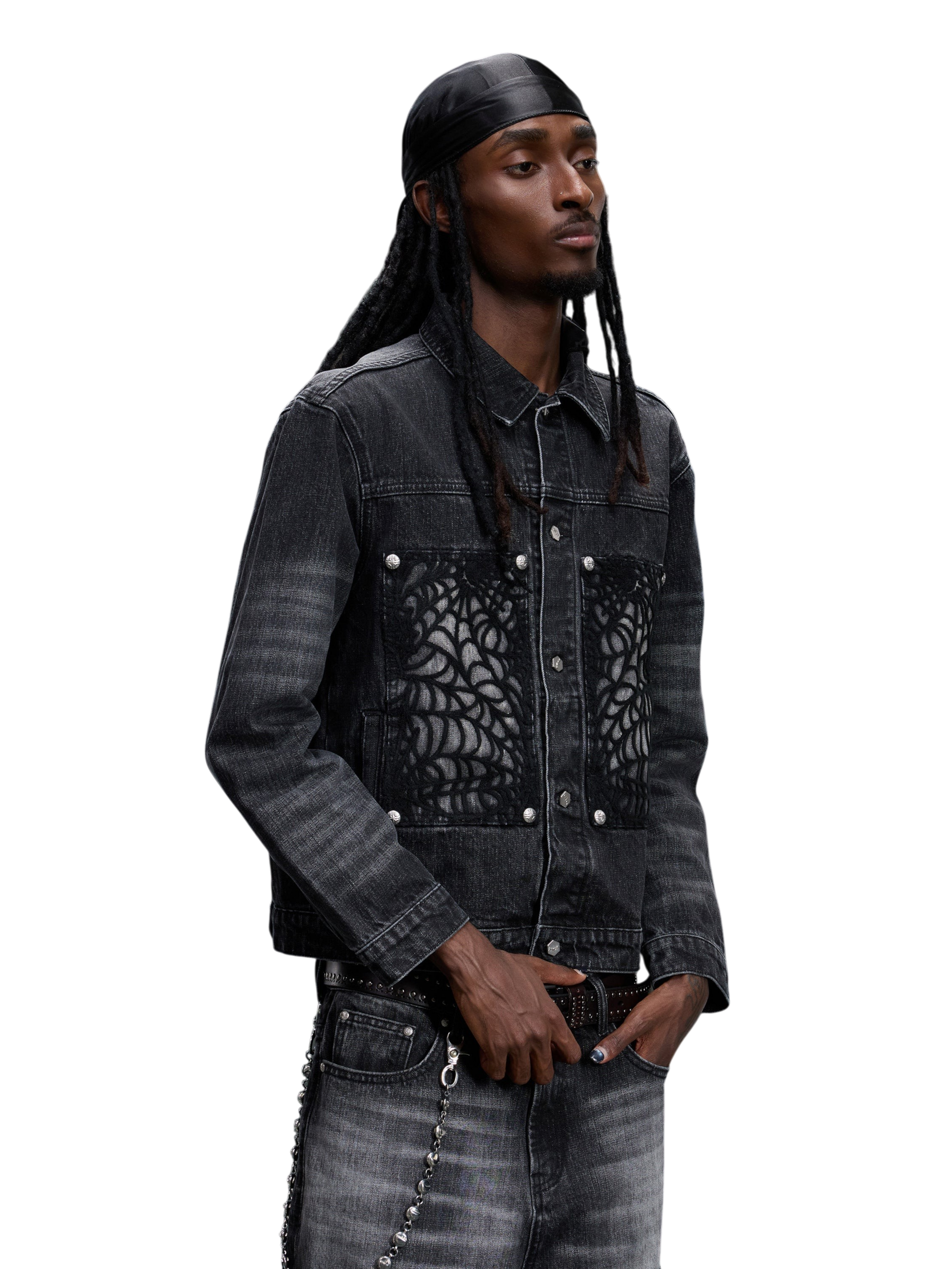 TBHNP T260016 black denim jacket, angled front view on model.