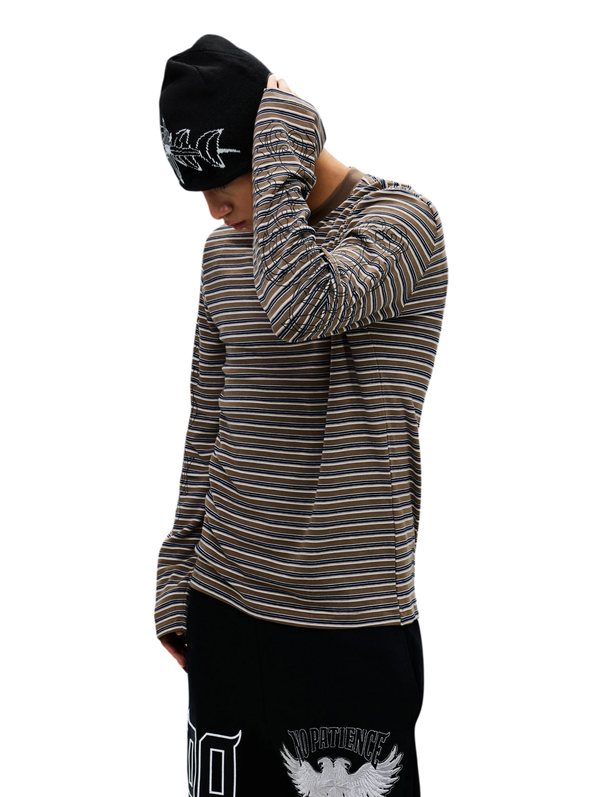 Model wearing the Army Green Luminous Dawn striped long-sleeve tee