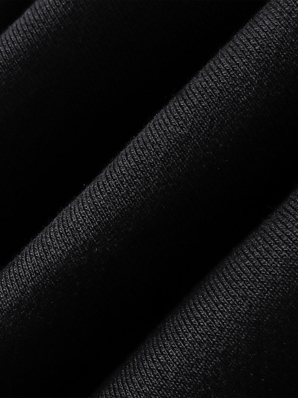 Close-up of the Grey Blue pants embroidered leather panel.