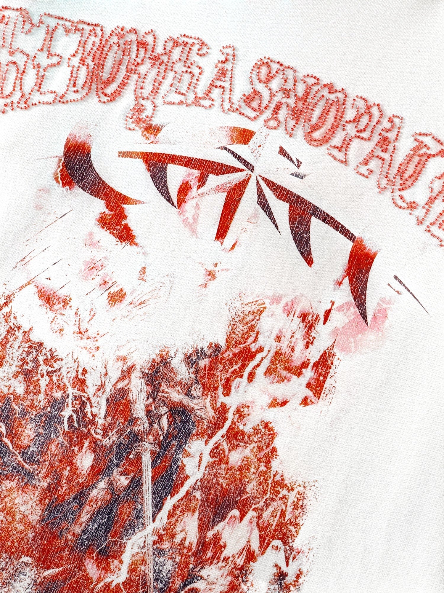 TBHNP Luminous Dawn distressed knight graphic long sleeve tee with bead-embroidered gothic lettering