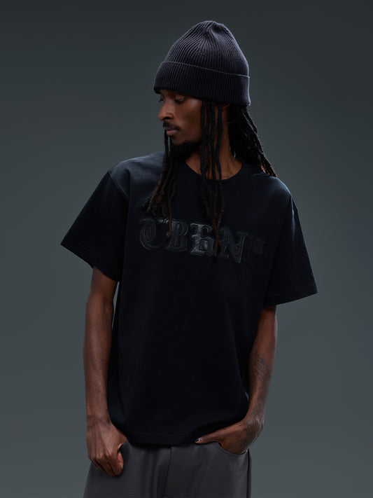 LUMINOUS DAWN LEATHER PATCH S/S TEE