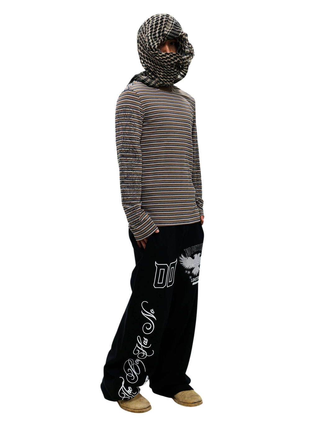 Model wearing the Black Luminous Dawn striped long-sleeve tee