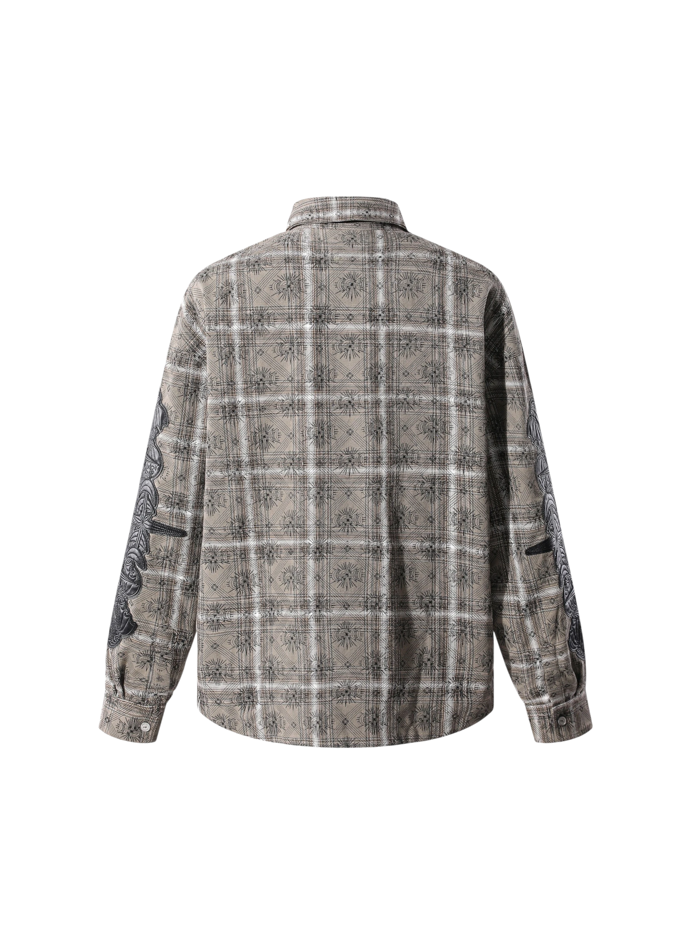 Close-up of the plaid fabric, rivets, and metal-set leather patch.