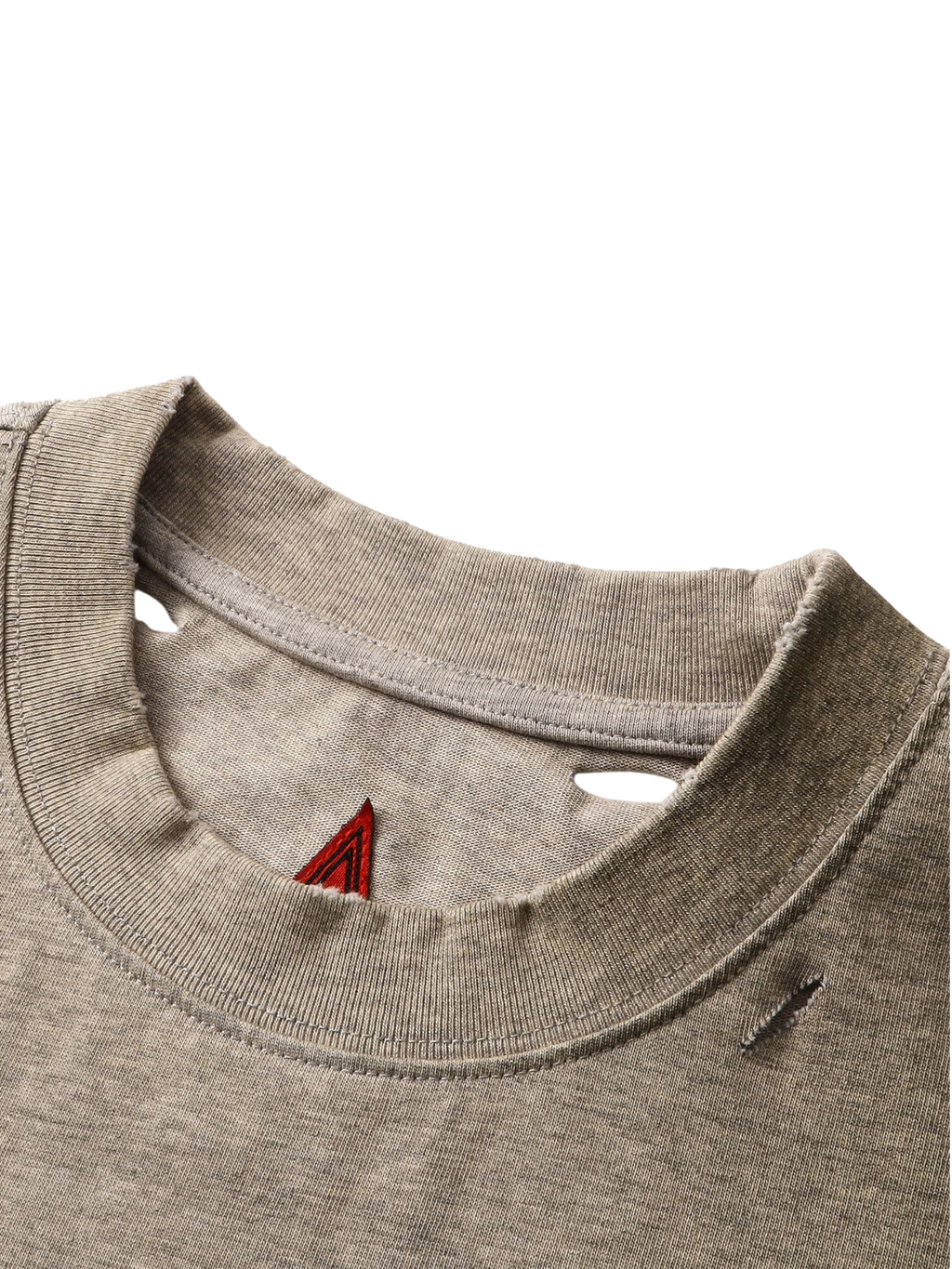 Close-up of the neckline and print on TBHNP floral-grey arrival tee — men's streetwear detail