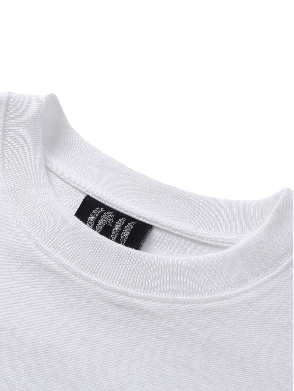 Close-up of the crew neck on TBHNP white Emblem & Shadowbat tee — men's streetwear detail