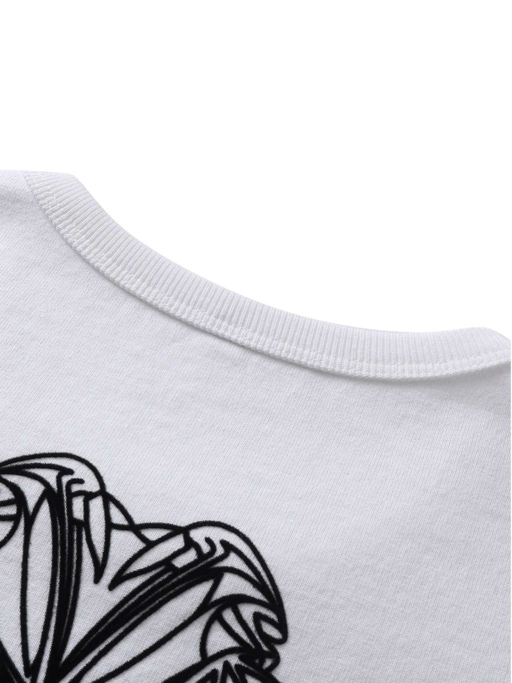 Close-up of the shadowbat starburst print on TBHNP Shadowbat vest — men's streetwear detail