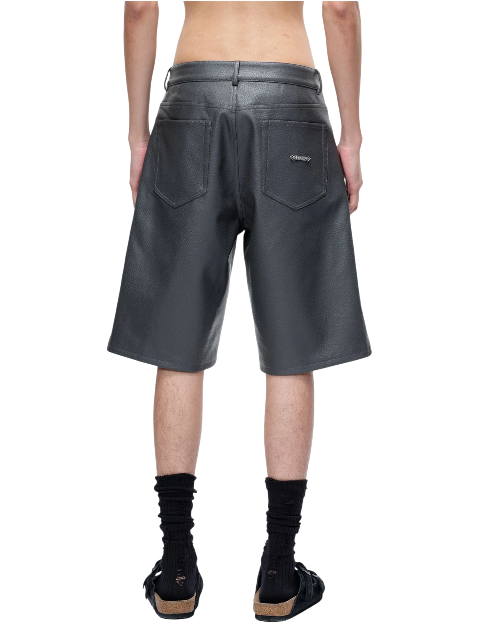 Model wearing TBHNP black faux-leather wide-leg shorts, front — men's streetwear shorts