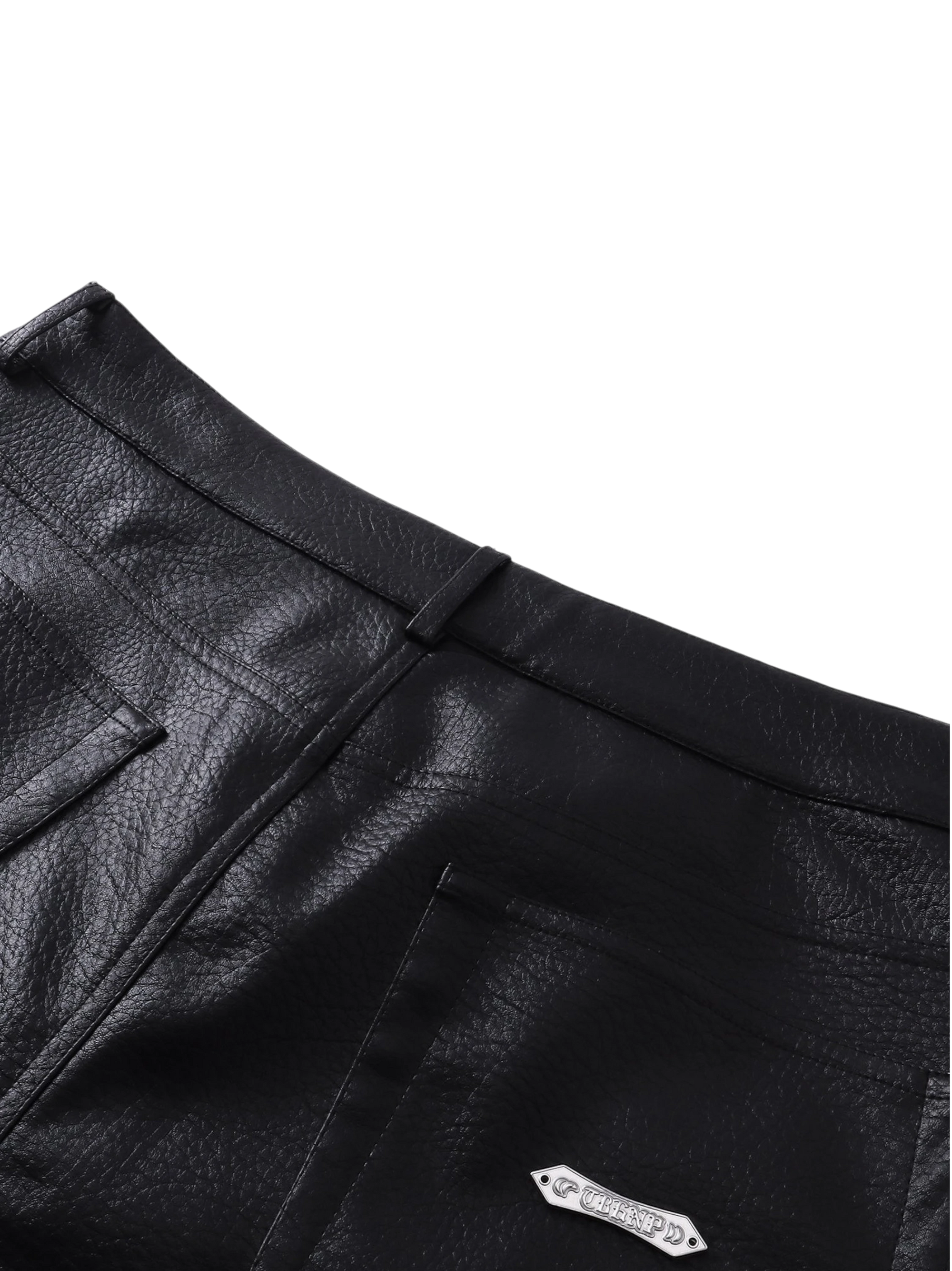 Close-up of the waistband on TBHNP black faux-leather shorts — men's streetwear detail