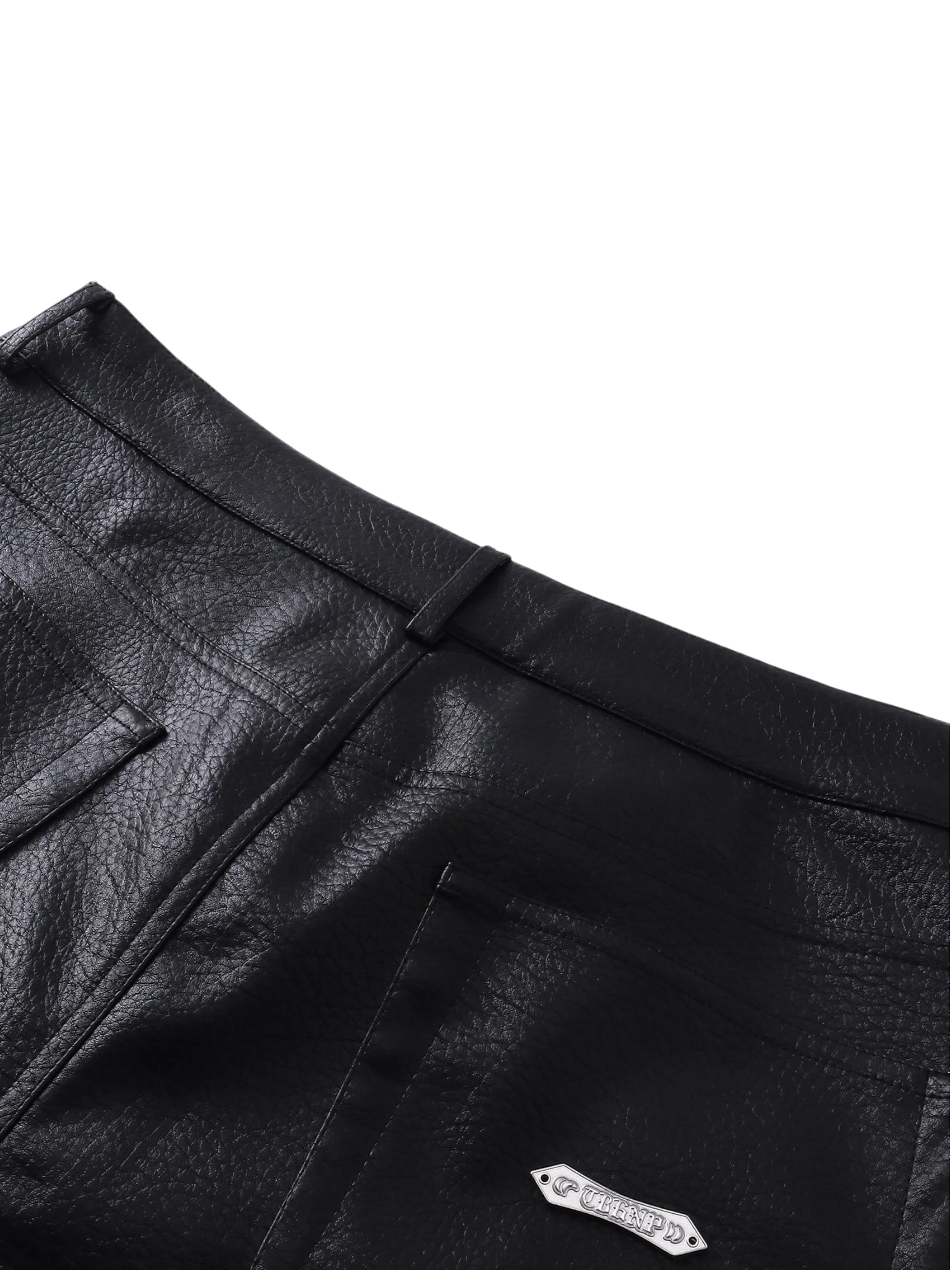 Close-up of the waistband on TBHNP black faux-leather shorts — men's streetwear detail