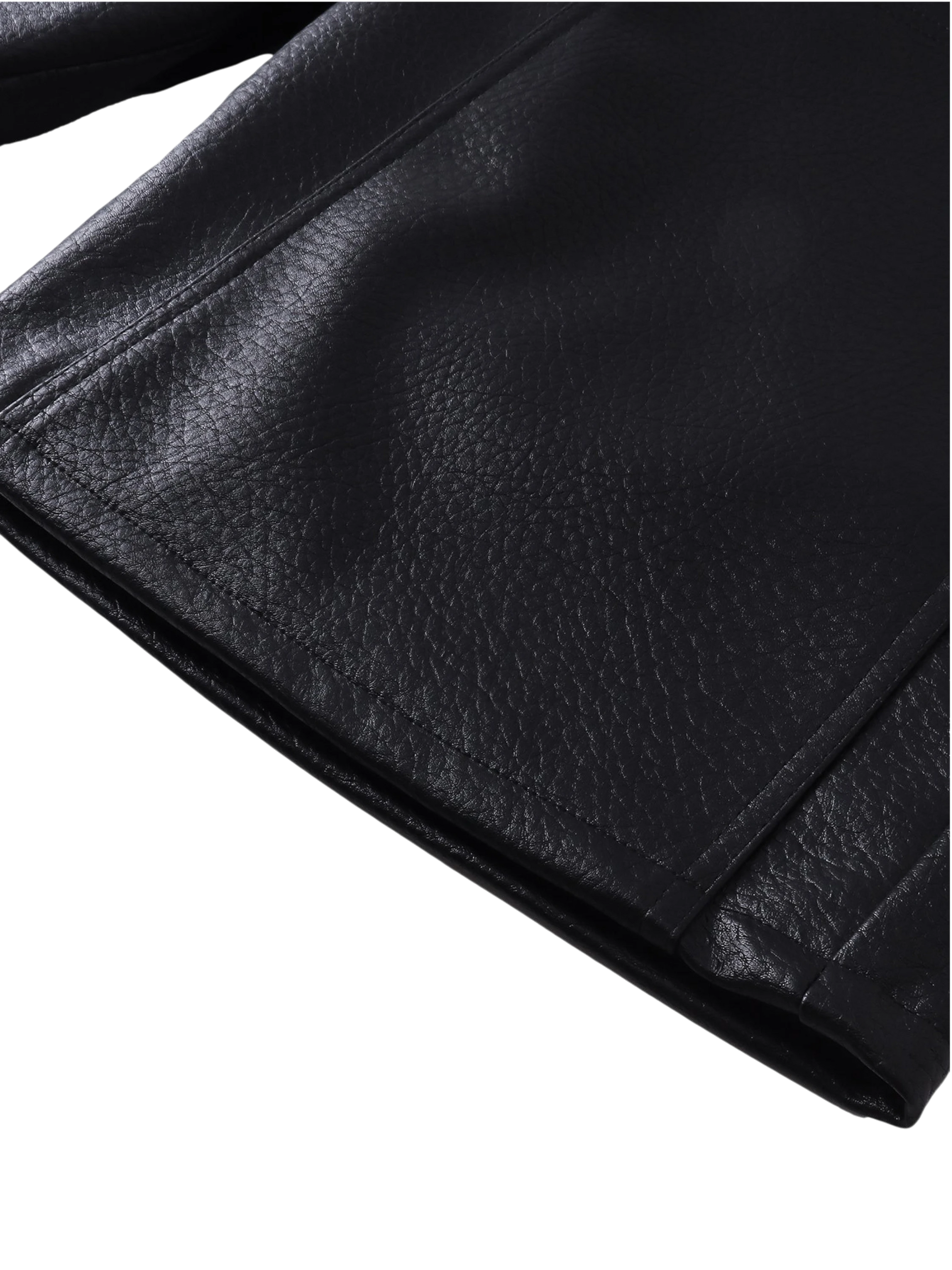 Close-up of the back pocket on TBHNP black faux-leather shorts — men's streetwear detail