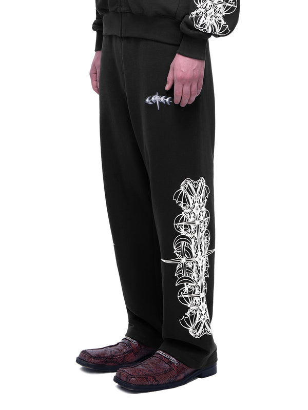 LUMINOUS DAWN ASTRAL LOGO FLOCKED PANTS