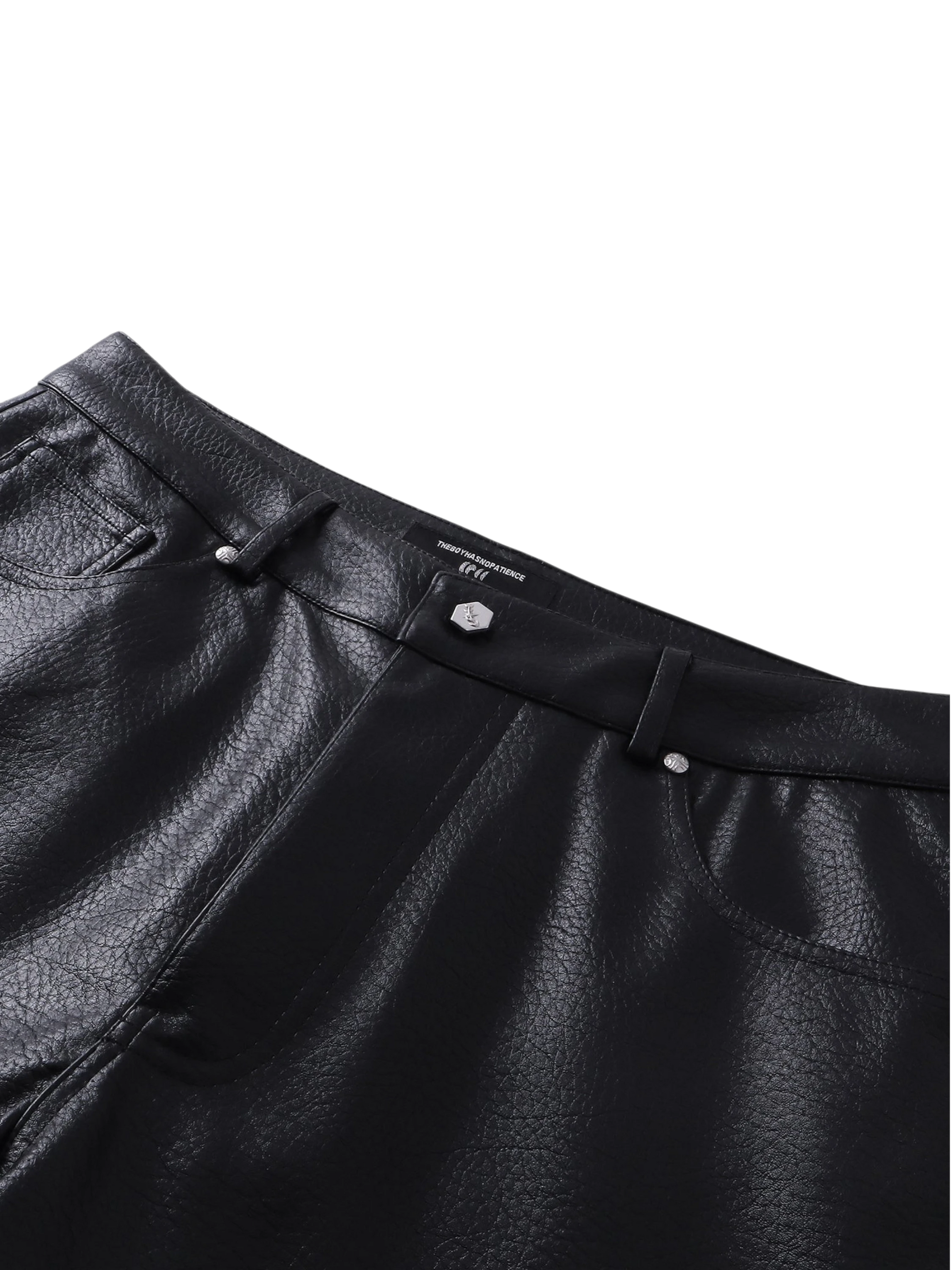 Close-up of the leather seam on TBHNP faux-leather shorts — men's streetwear detail