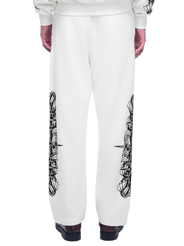 LUMINOUS DAWN ASTRAL LOGO FLOCKED PANTS