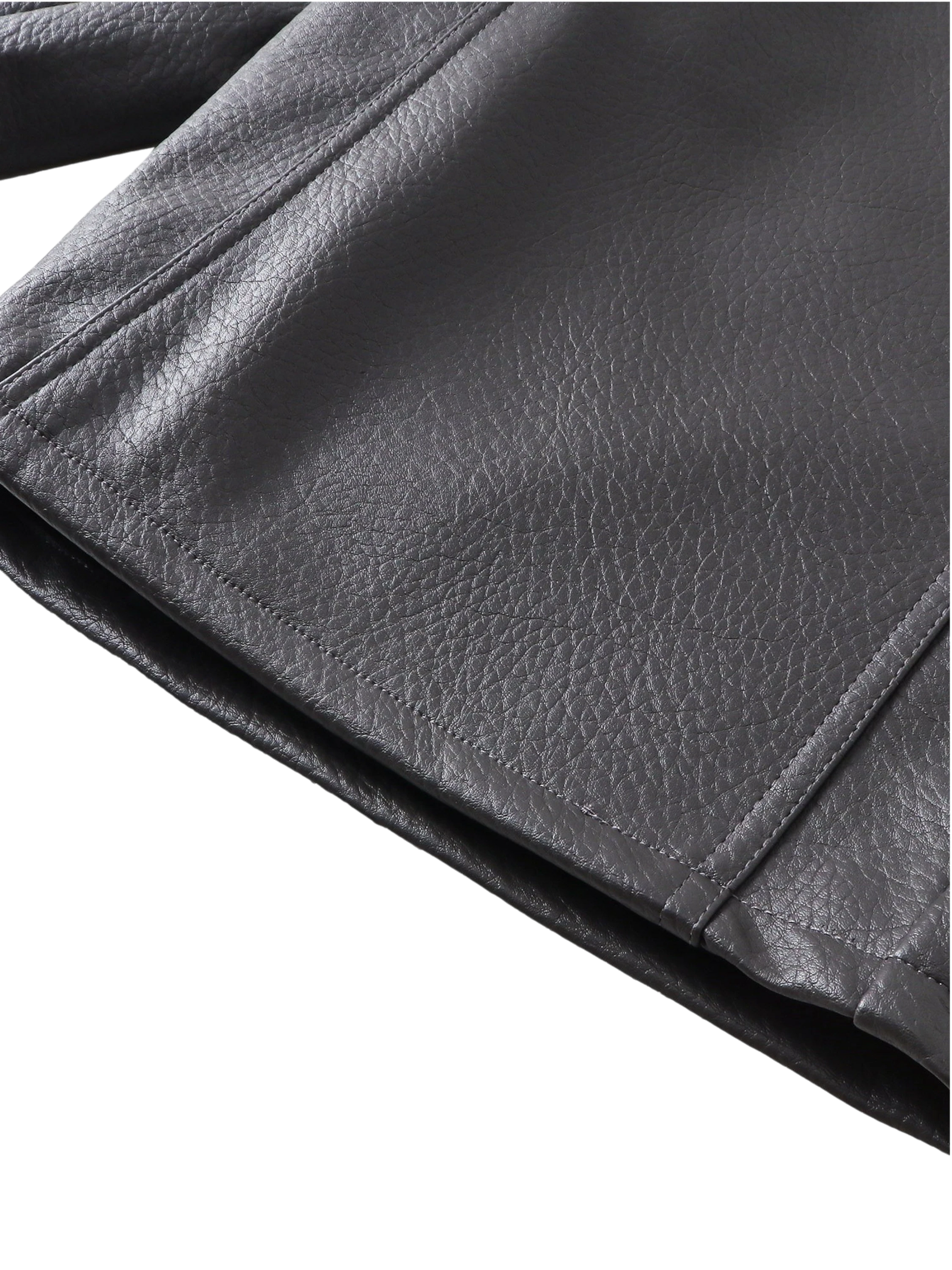 Close-up of the pocket on TBHNP black faux-leather shorts — men's streetwear detail