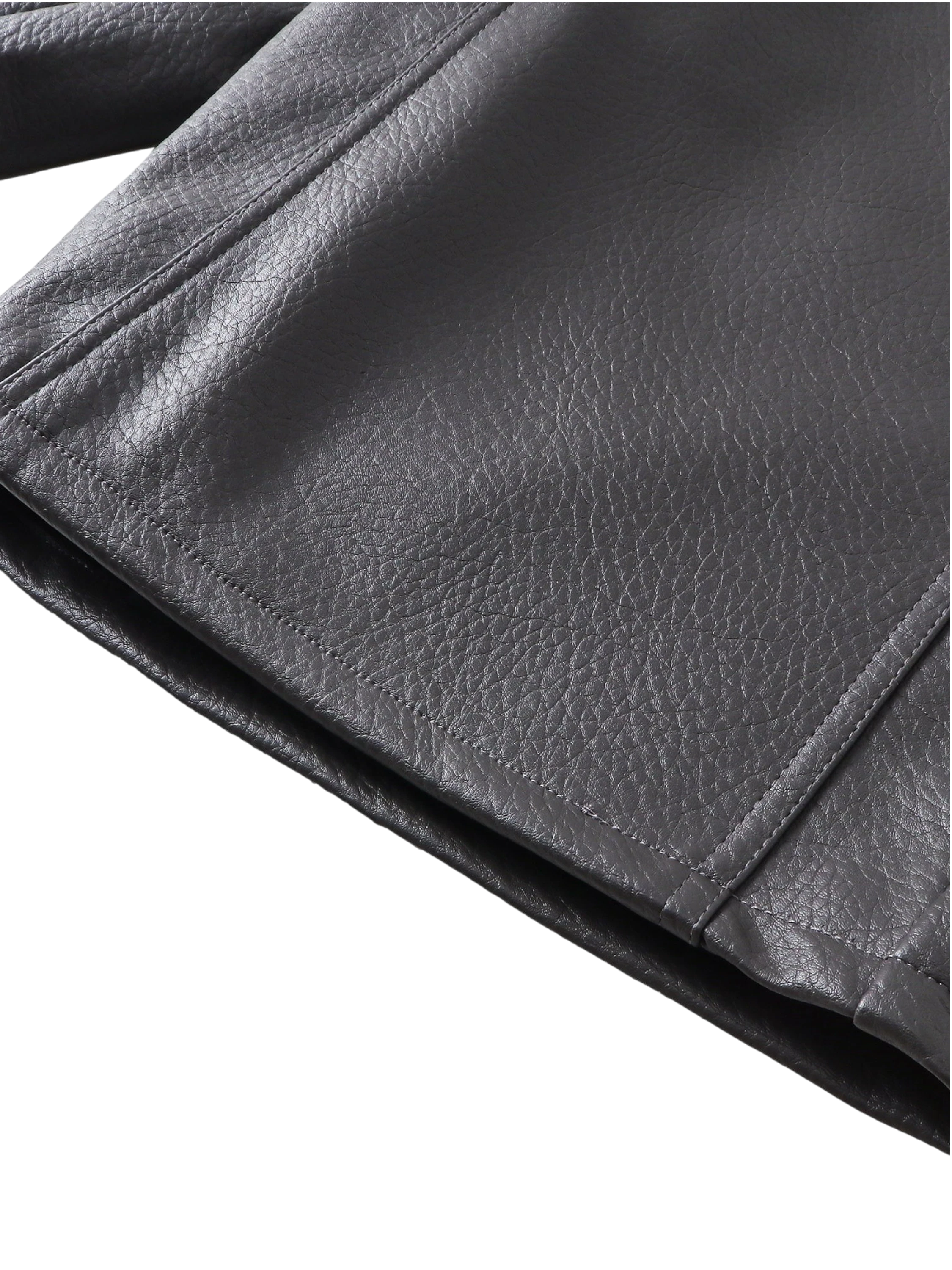 Close-up of the pocket on TBHNP black faux-leather shorts — men's streetwear detail