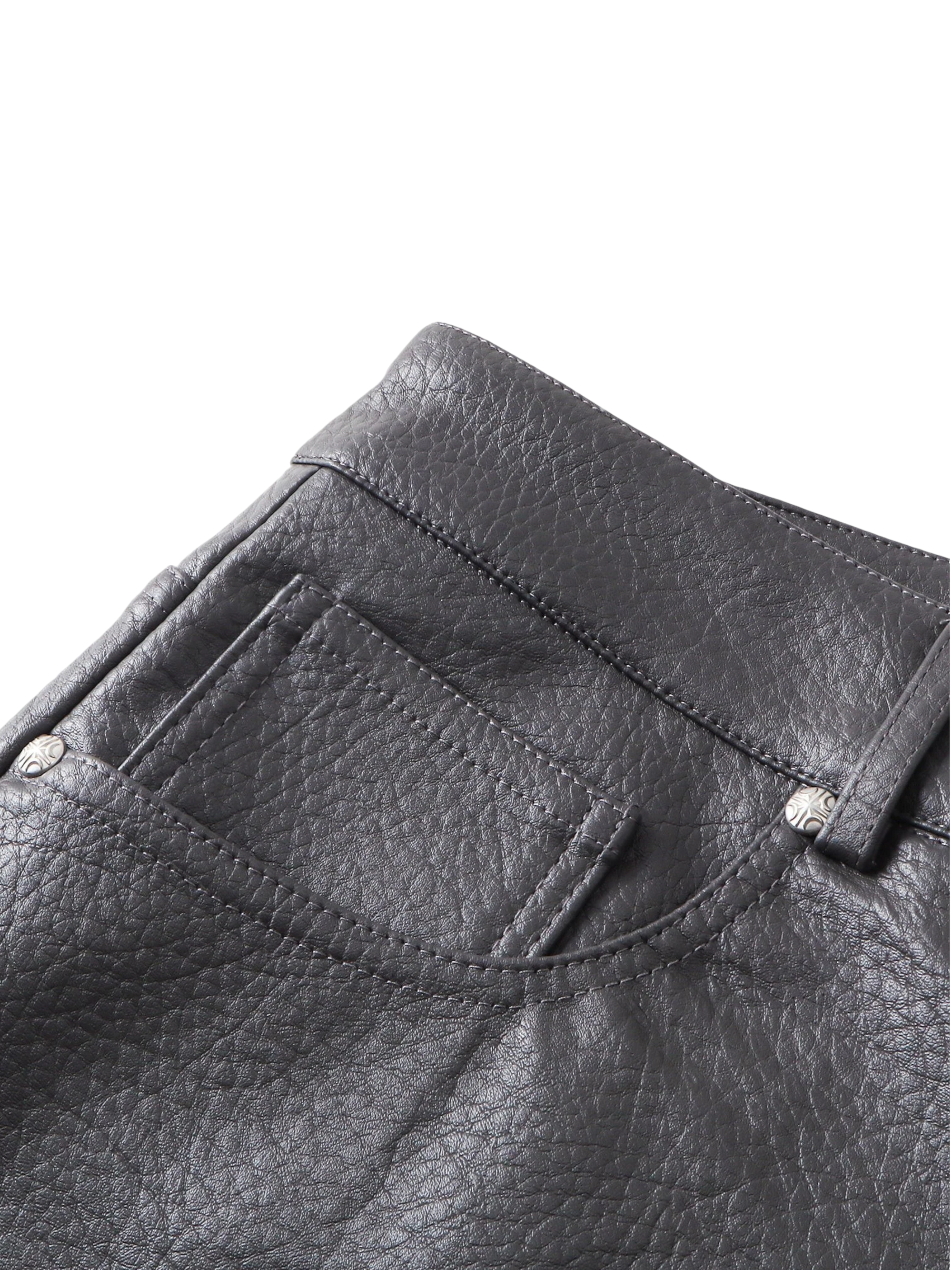 Close-up of the back pocket on TBHNP black faux-leather shorts — men's streetwear detail