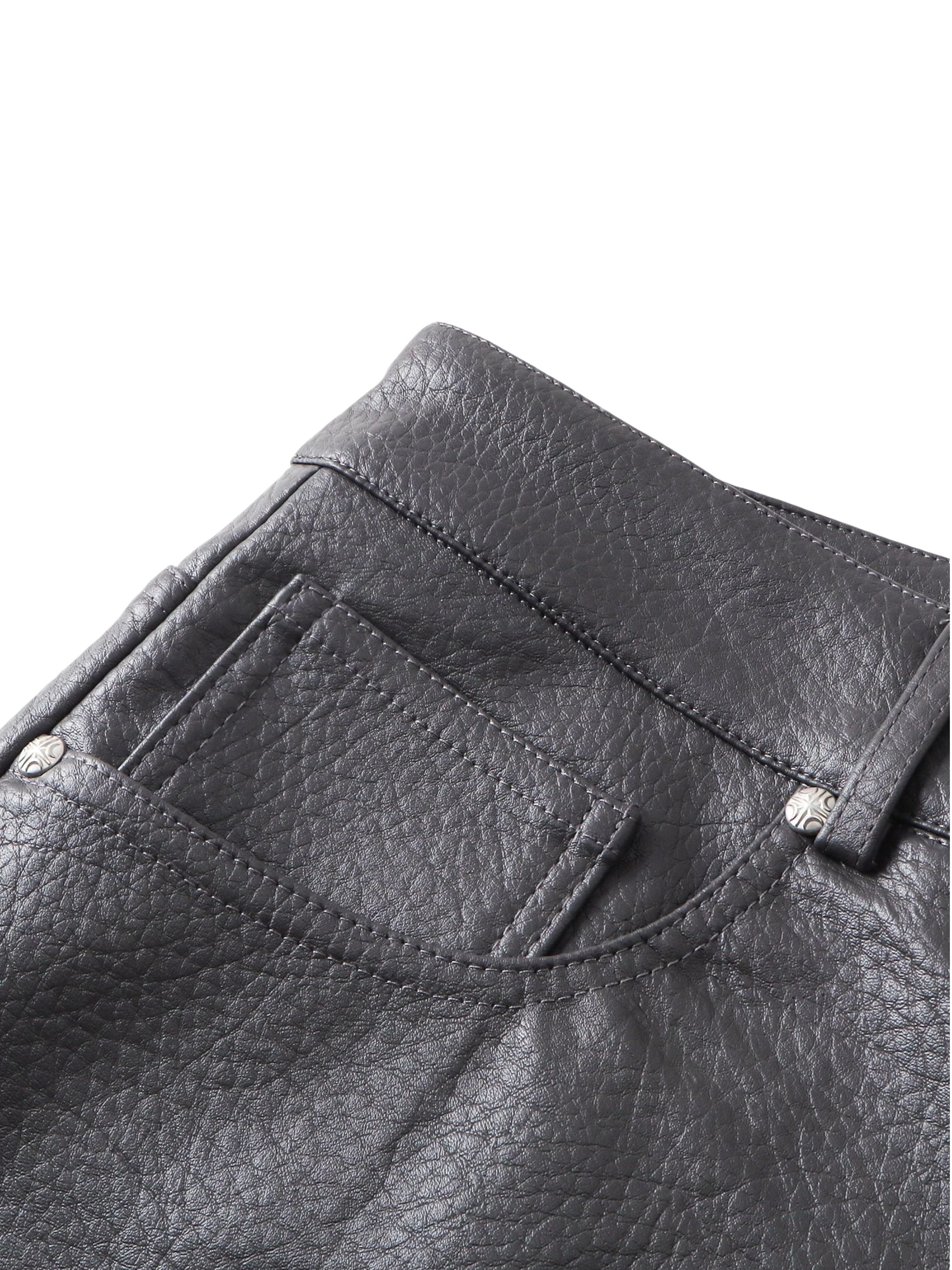 Close-up of the back pocket on TBHNP black faux-leather shorts — men's streetwear detail