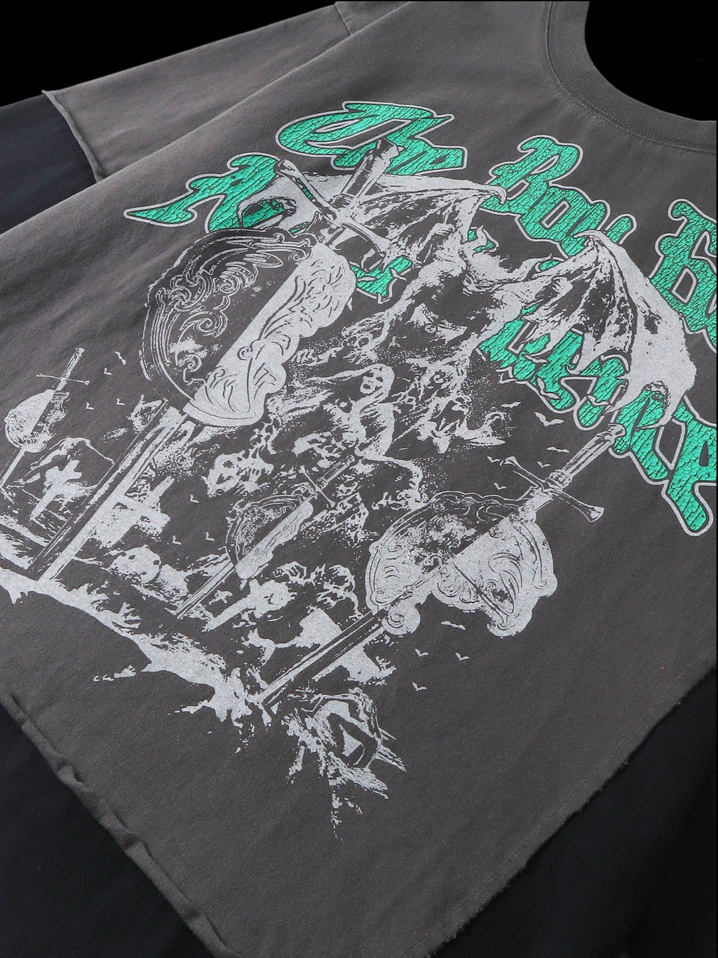 Close-up of the knight engraving front print on TBHNP black tee — men's streetwear detail