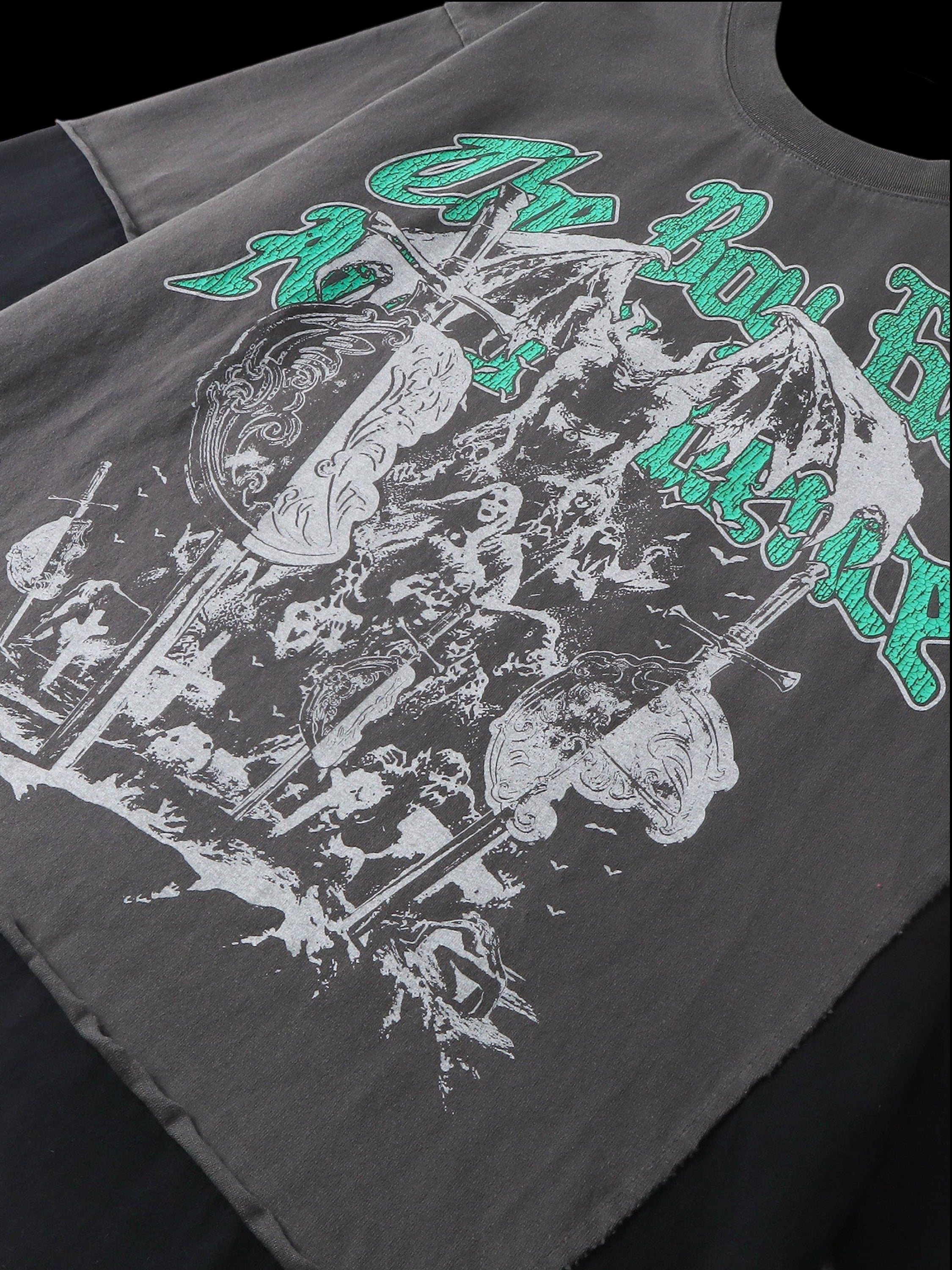 Close-up of the knight engraving front print on TBHNP black tee — men's streetwear detail