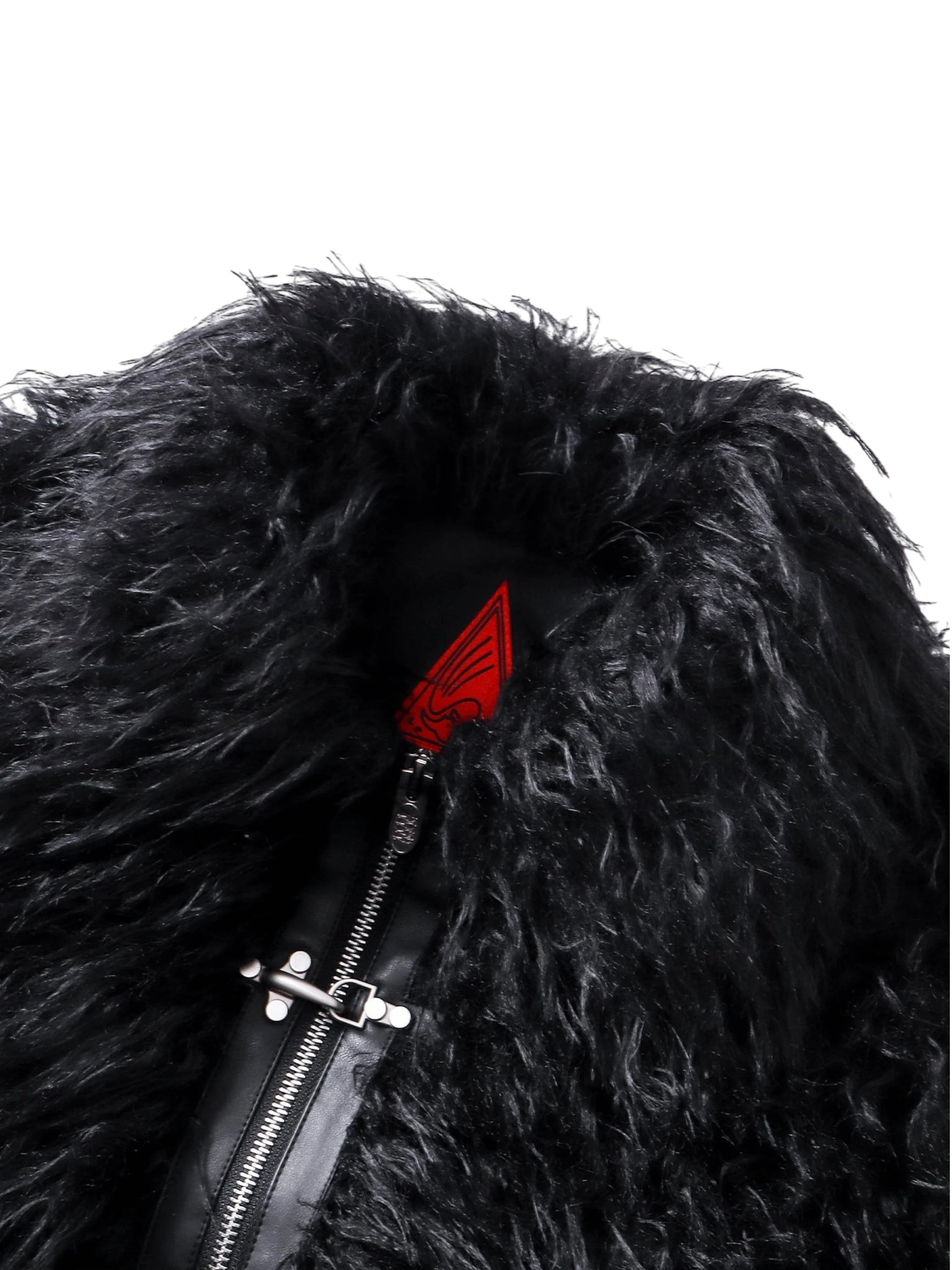 Close-up of the faux-fur collar with red logo accent on TBHNP bomber jacket — men's streetwear detail