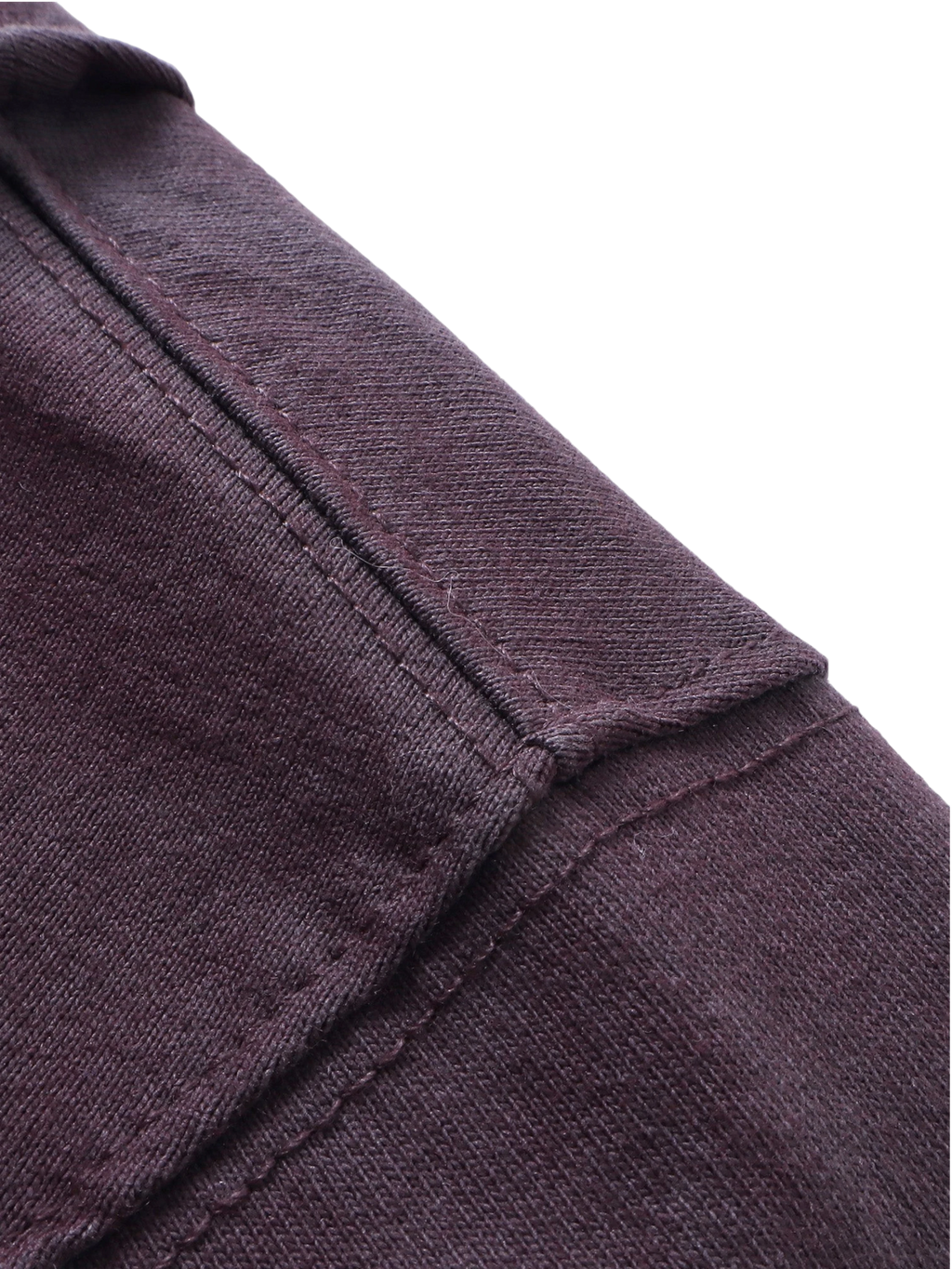 Close-up of the sword-and-bone front print on TBHNP black tee — men's streetwear detail