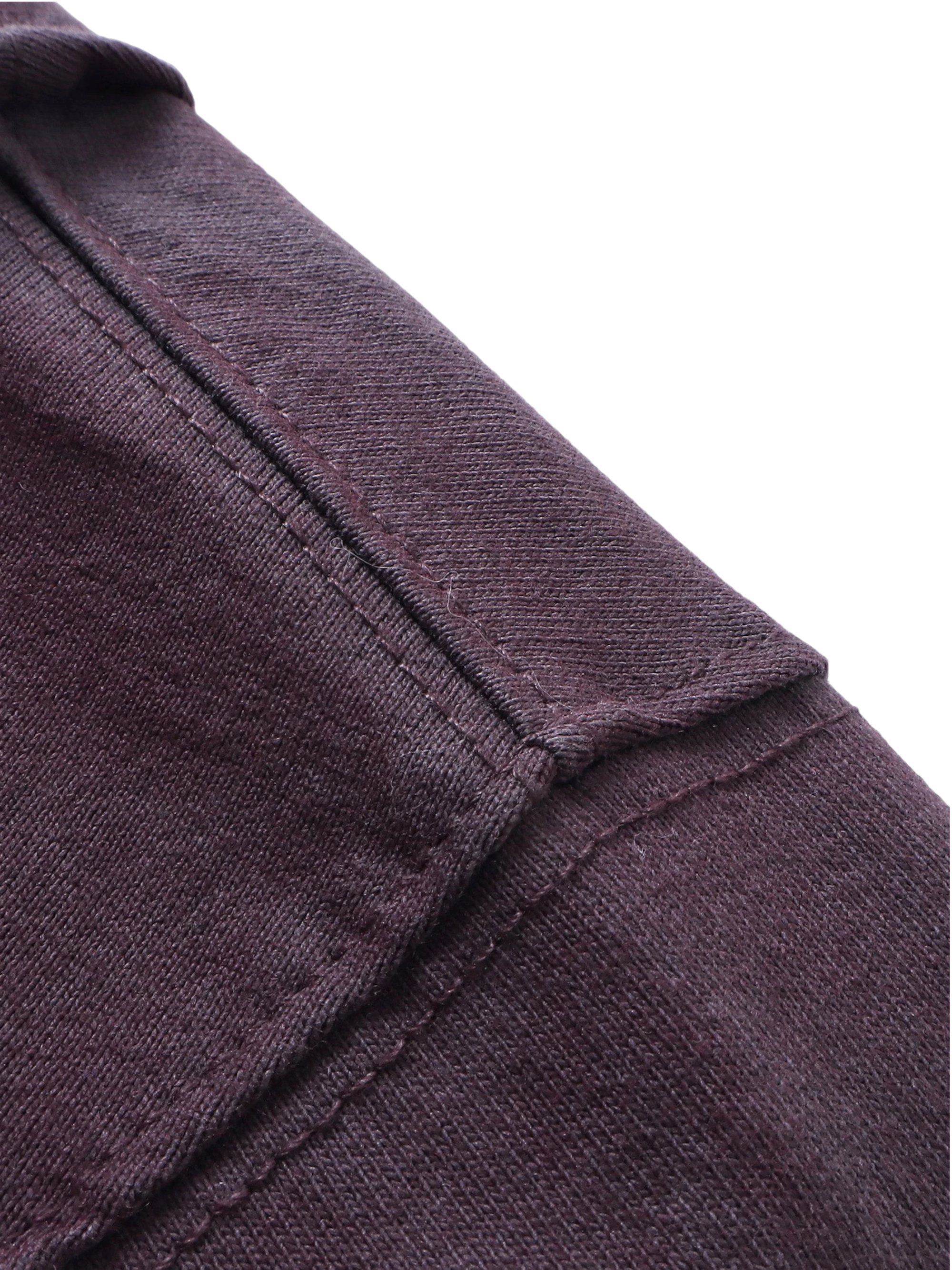 Close-up of the sword-and-bone front print on TBHNP black tee — men's streetwear detail