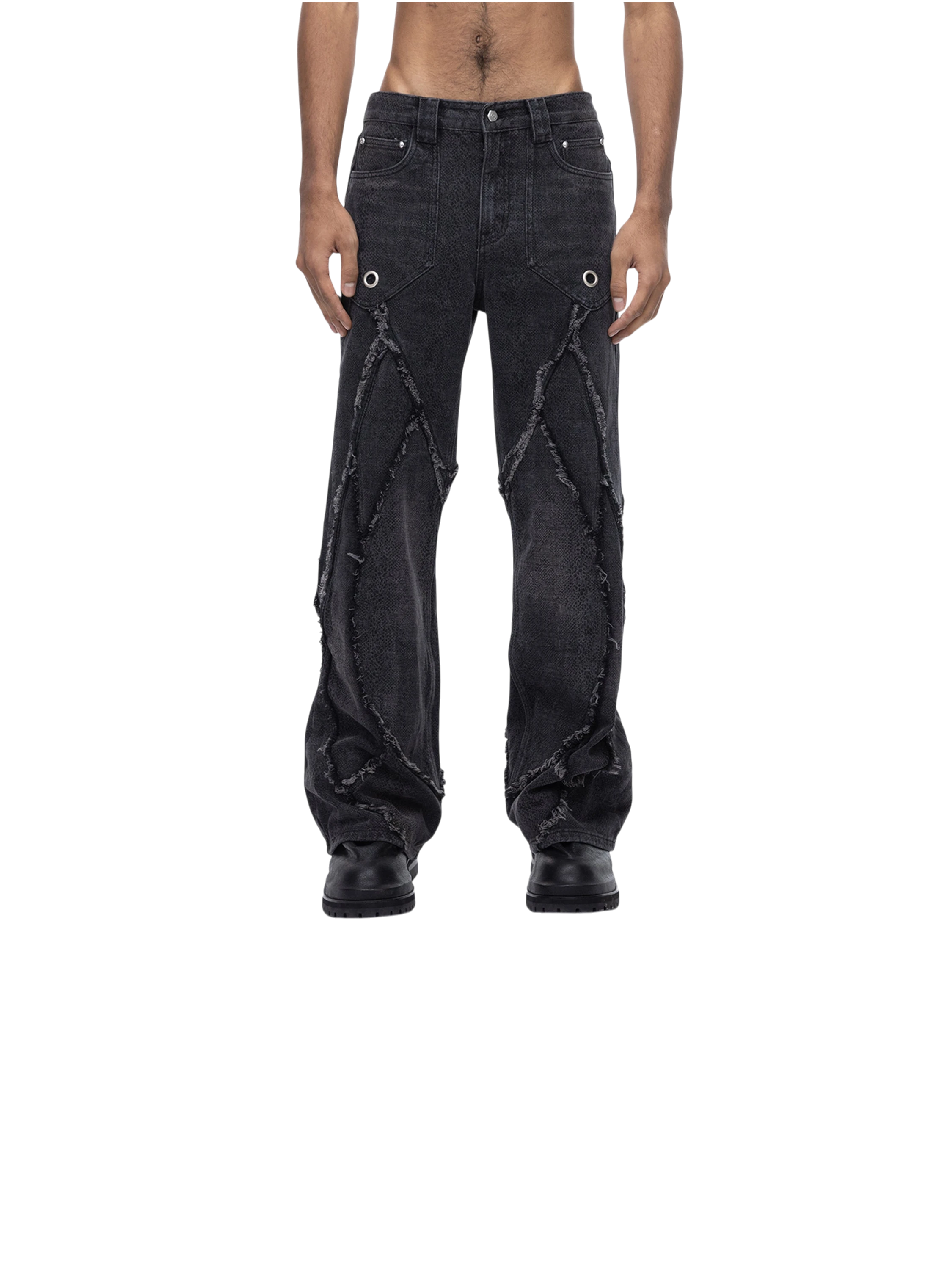 Model wearing TBHNP black baggy jeans, back lower-body view — men's streetwear denim
