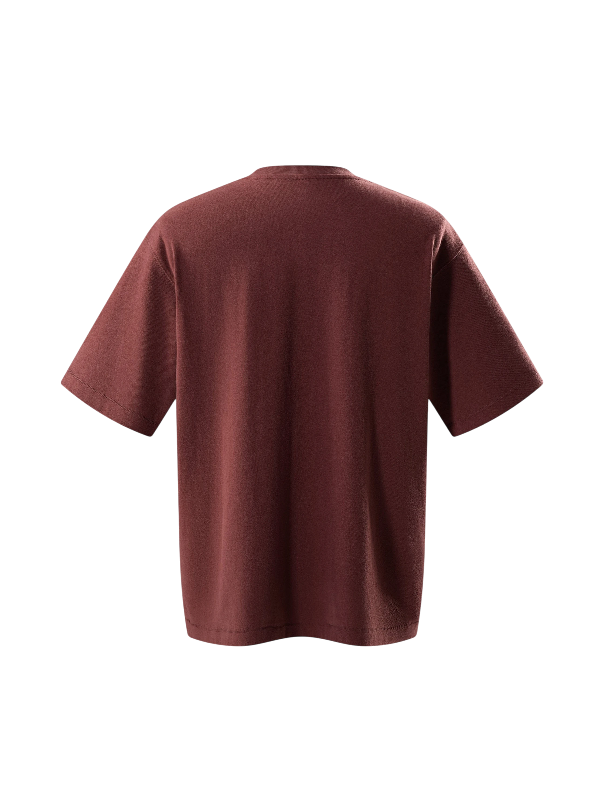 Close-up of the knight sword-and-shield print on TBHNP red tee — men's streetwear detail