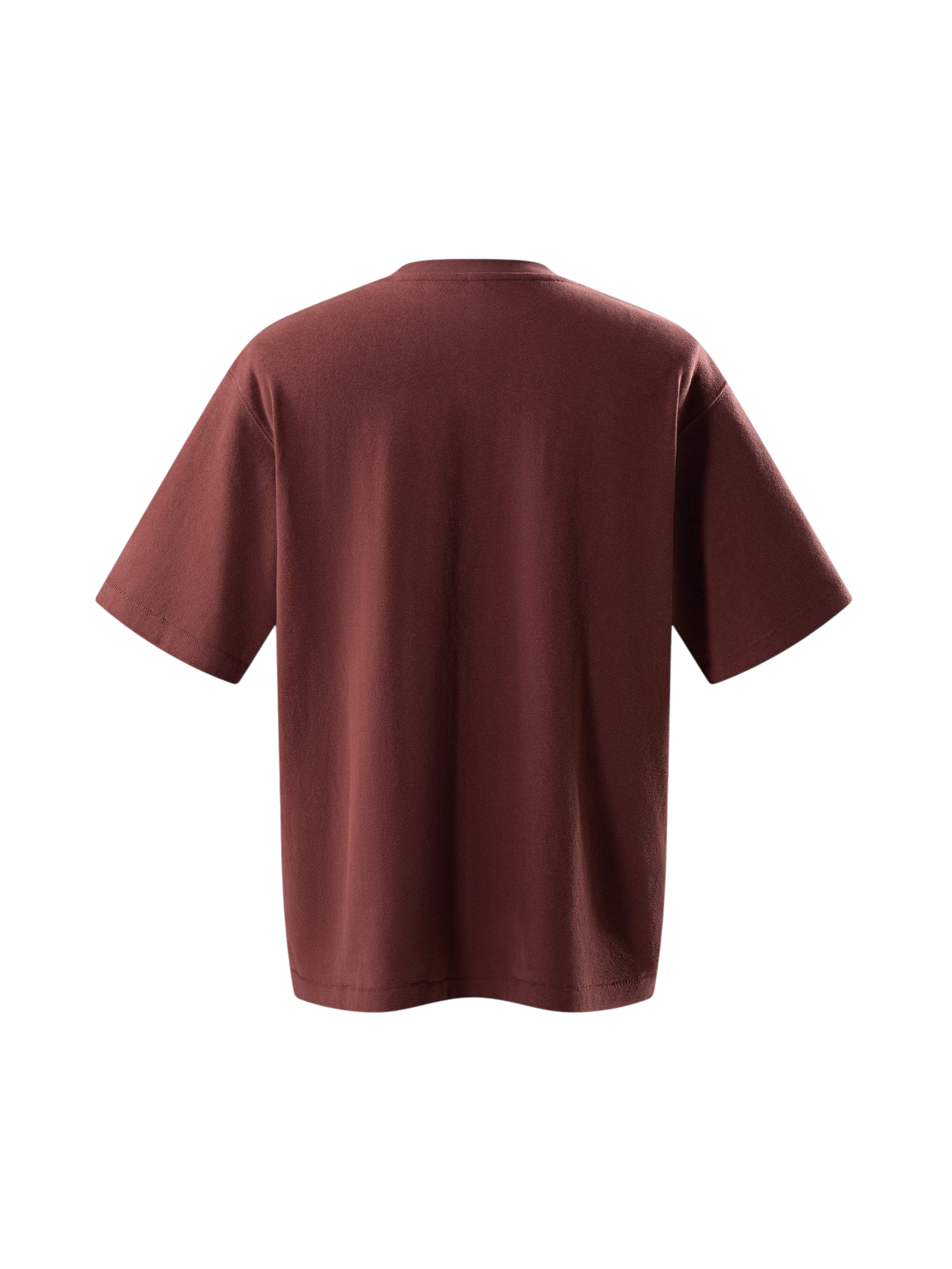 Close-up of the knight sword-and-shield print on TBHNP red tee — men's streetwear detail