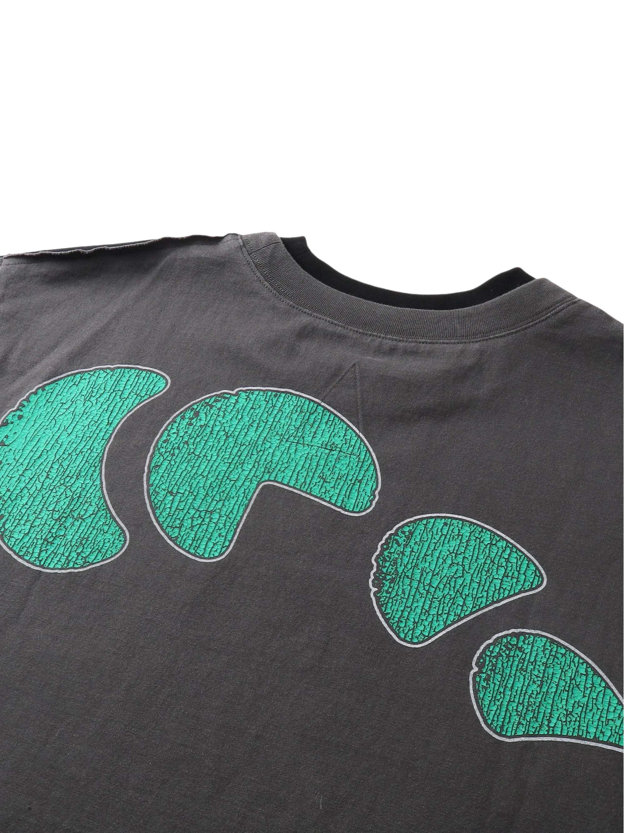 Close-up of the crescent-moon back print on TBHNP black knight tee — men's streetwear detail