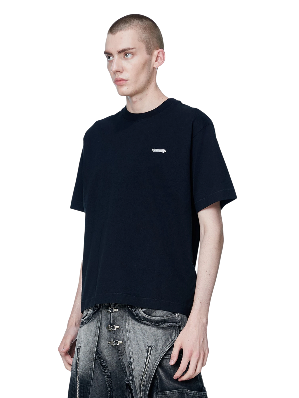 Model wearing TBHNP black Emblem & Shadowbat tee, back view with emblem print — men's streetwear tee