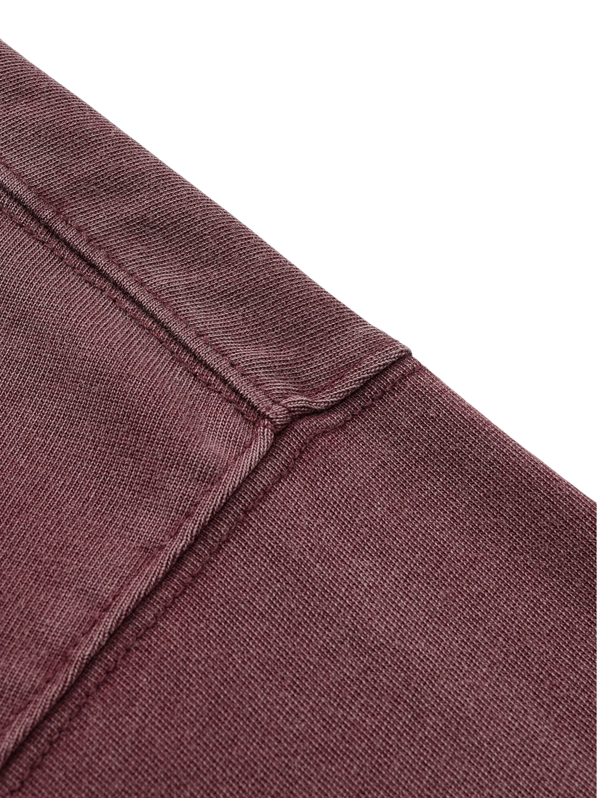 Close-up of the pink Wraith Sorcerer print on TBHNP burgundy tee — men's streetwear detail
