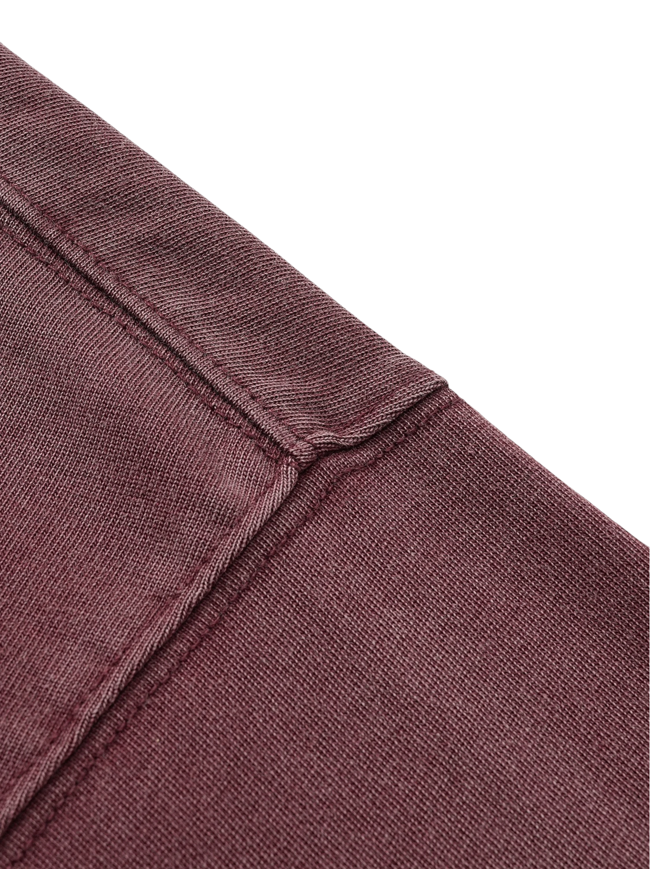 Close-up of the pink Wraith Sorcerer print on TBHNP burgundy tee — men's streetwear detail